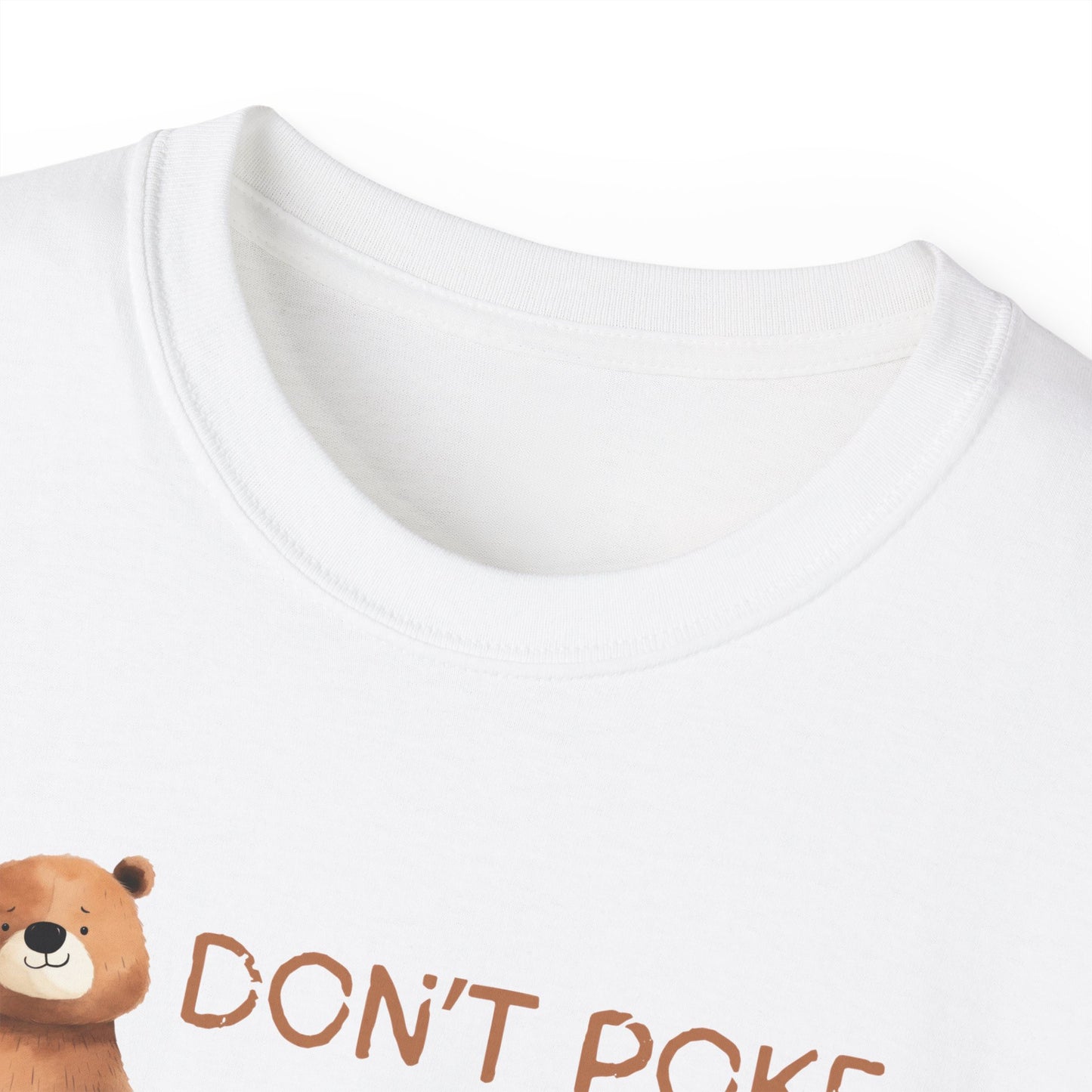 White t-shirt with a bear graphic and 'Don't Panic' text on a white background