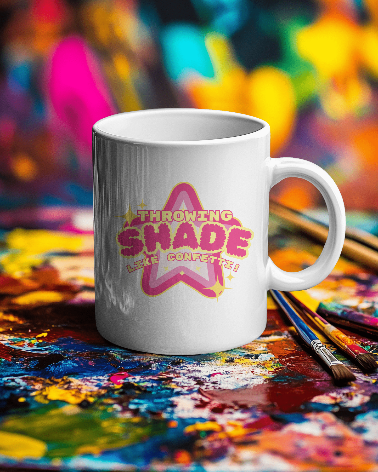 White mug with colorful text design on a paint-covered surface with brushes Throwing Shade, Shade, Queer Culture, LGBT, GAY