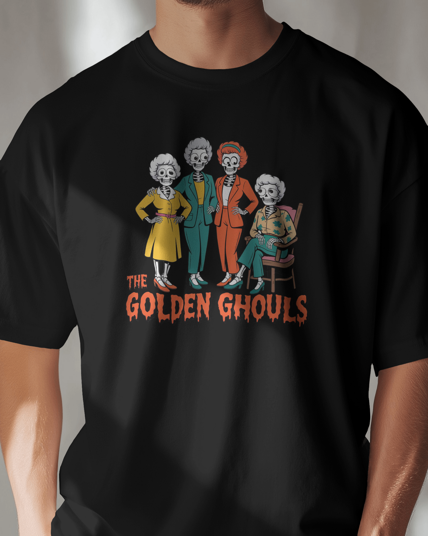 Black t-shirt with 'The Golden Ghouls' graphic design on a plain background Golden Girls, 80s TV, Halloween Tees