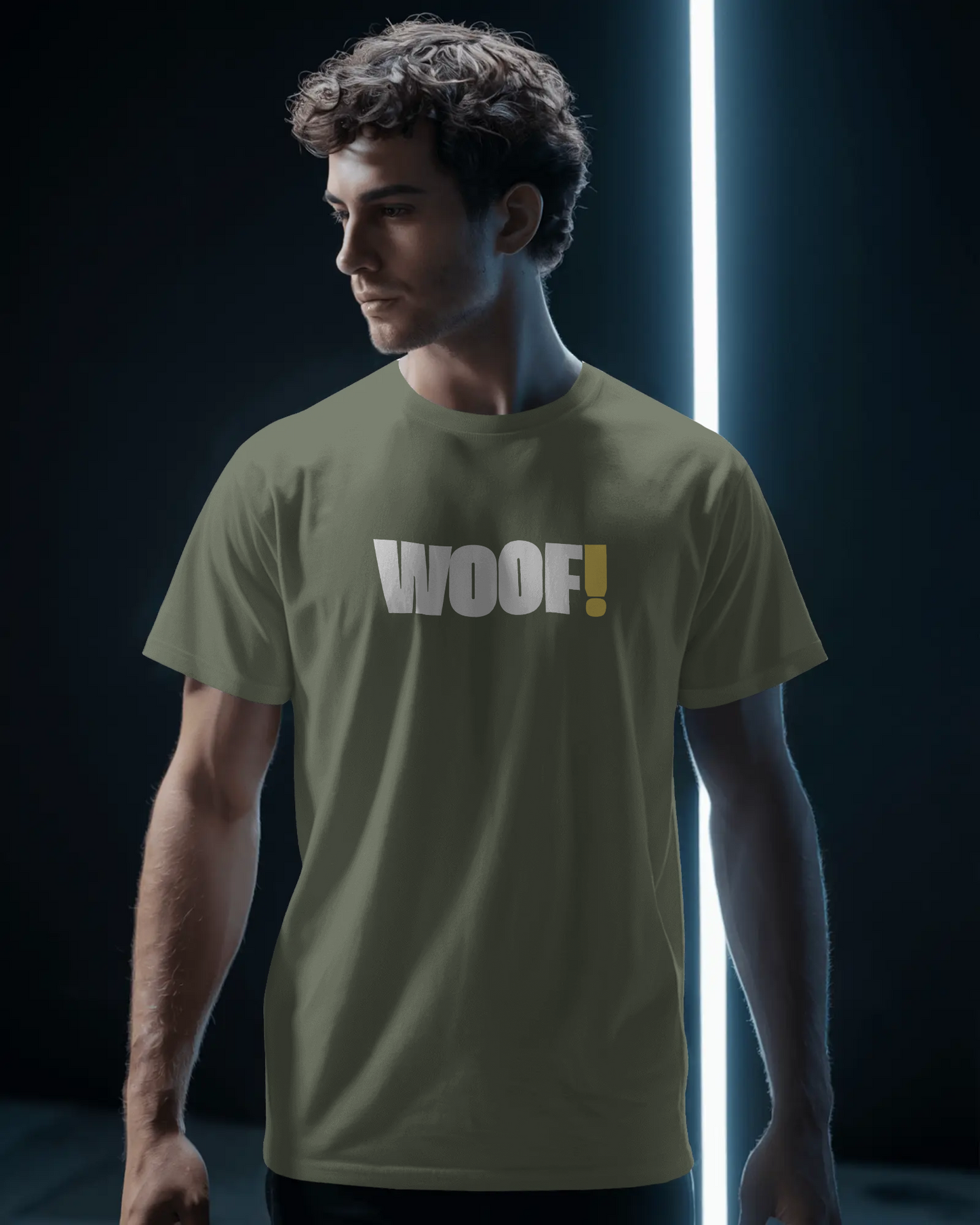 Man wearing a black t-shirt with 'WOOF!' text against a dark background LGBTQIA+ QUEER, Kink Positive