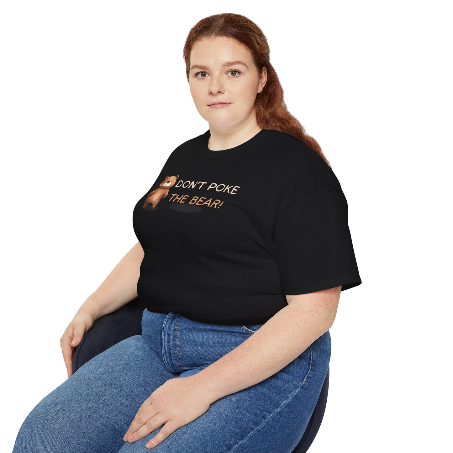 Person wearing a black t-shirt with text and graphic design on a white background