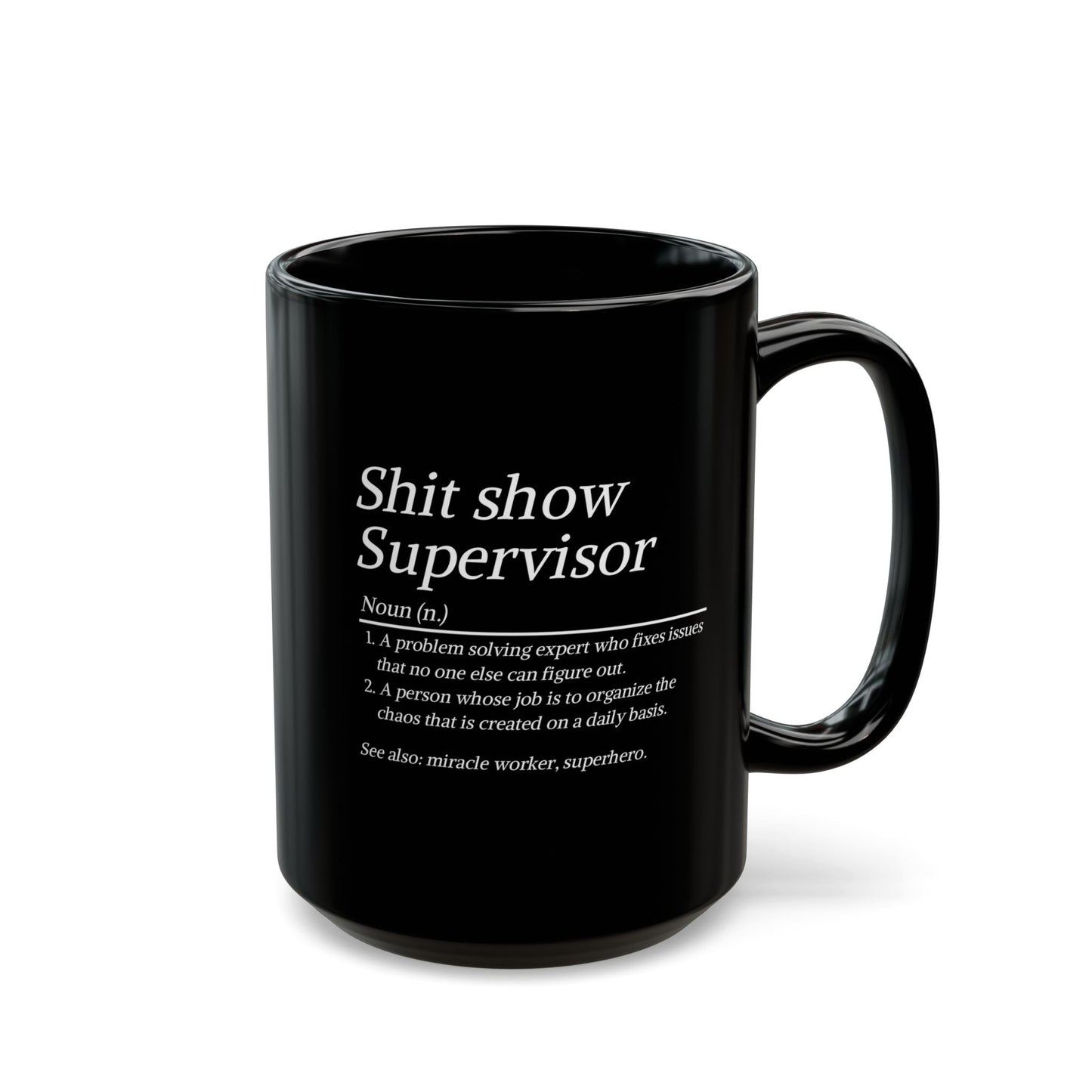 Black mug with white text on a white background