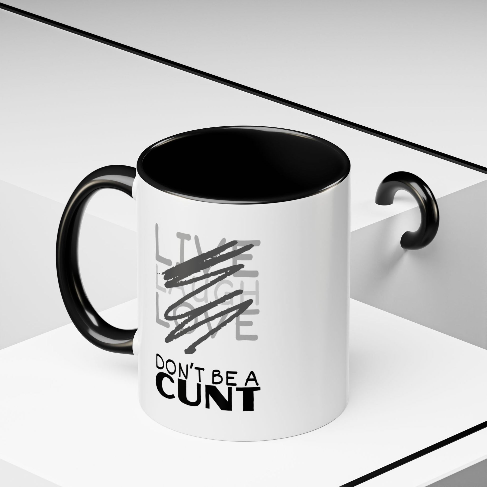 White mug with black interior and handle, featuring a graphic design and text on a white background.