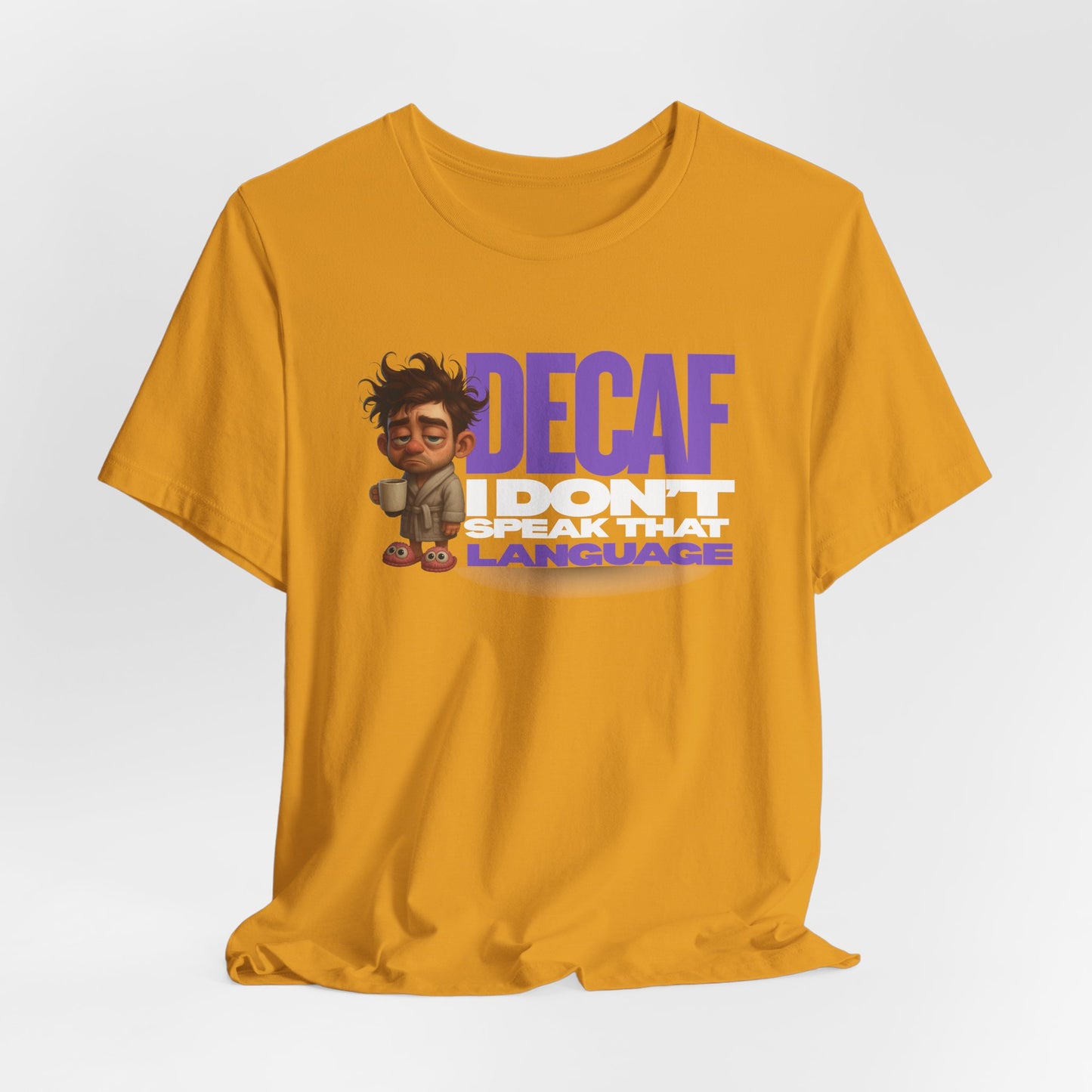 Yellow t-shirt with cartoon character and text 'DECAF I Don't Speak That Language' on a white background