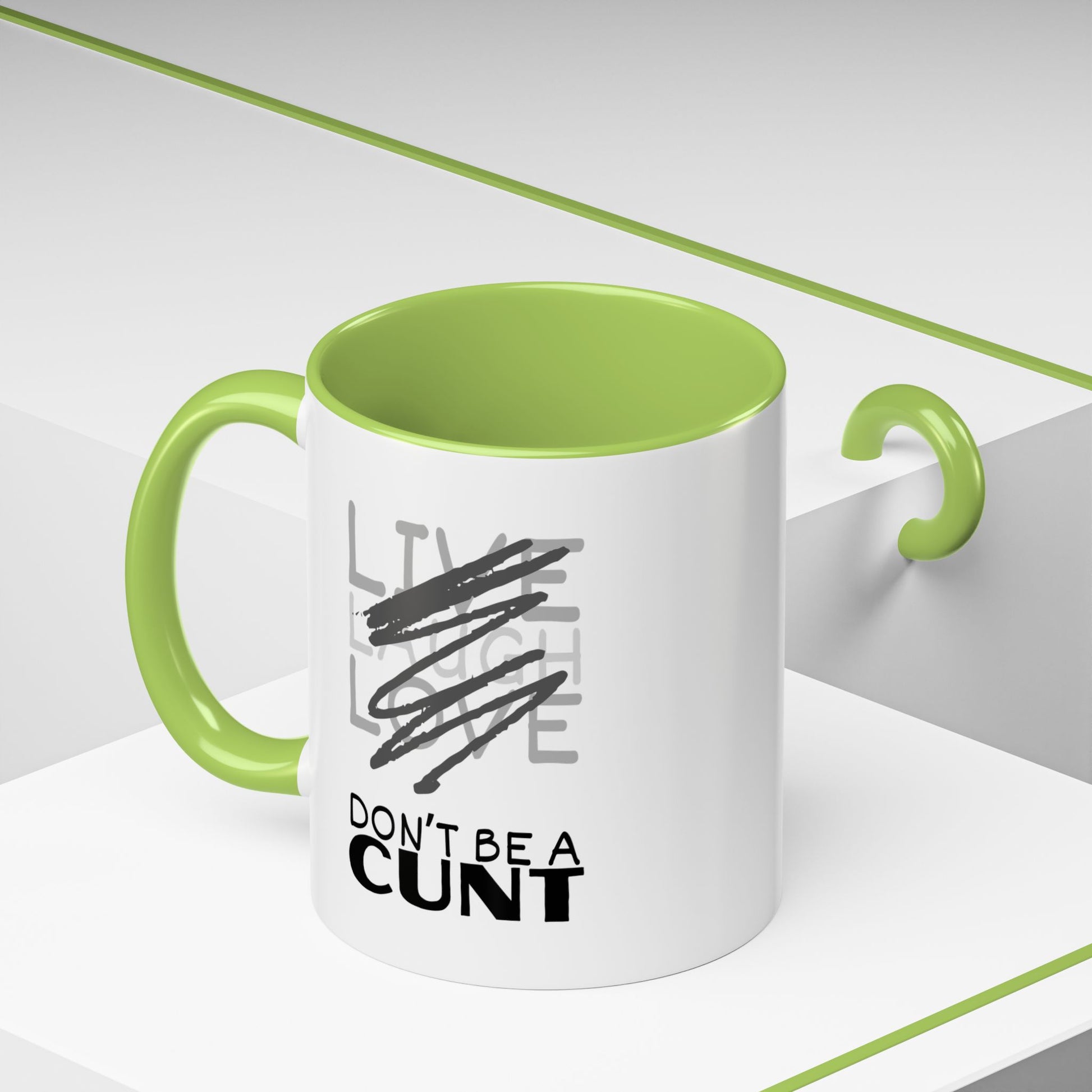 Mug with green interior and handle on a white background