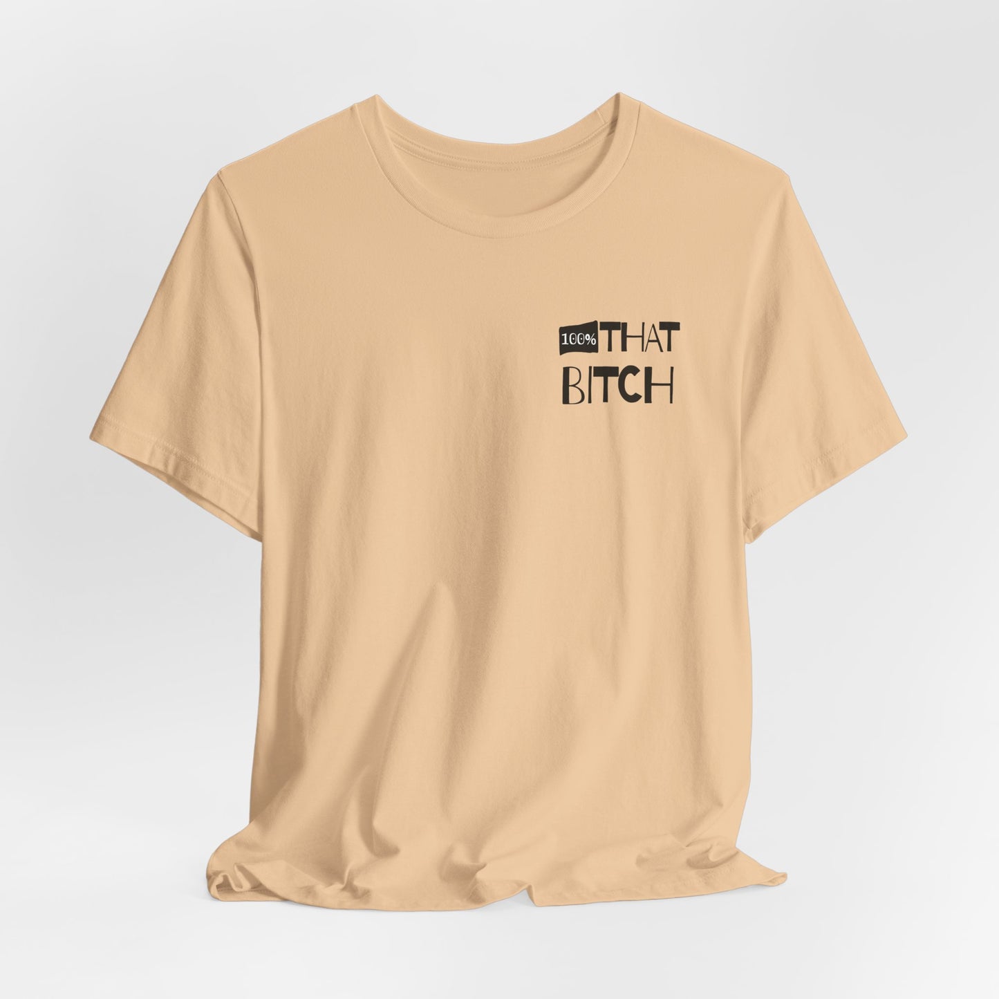 Beige t-shirt with graphic text on a light gray background  100% that Bitch
