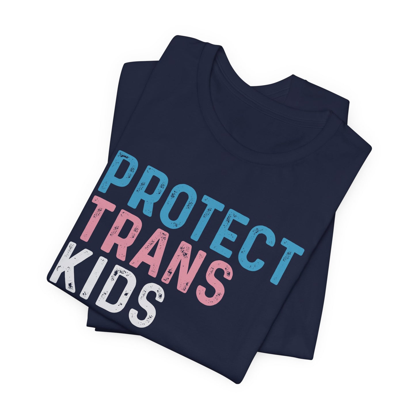Folded navy blue t-shirt with 'PROTECT TRANS KIDS' text in multicolor on a white background LGBTQIA+, Queer, Trans rights