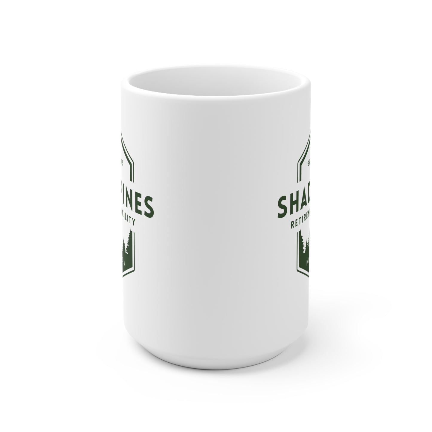 White mug with green text and logo on a white background