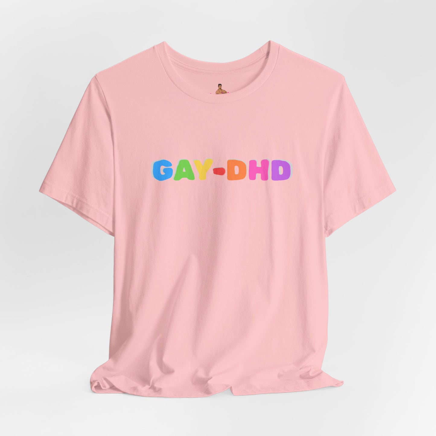 Pink t-shirt with 'GAY-DHD' text in colorful letters on a light gray background
