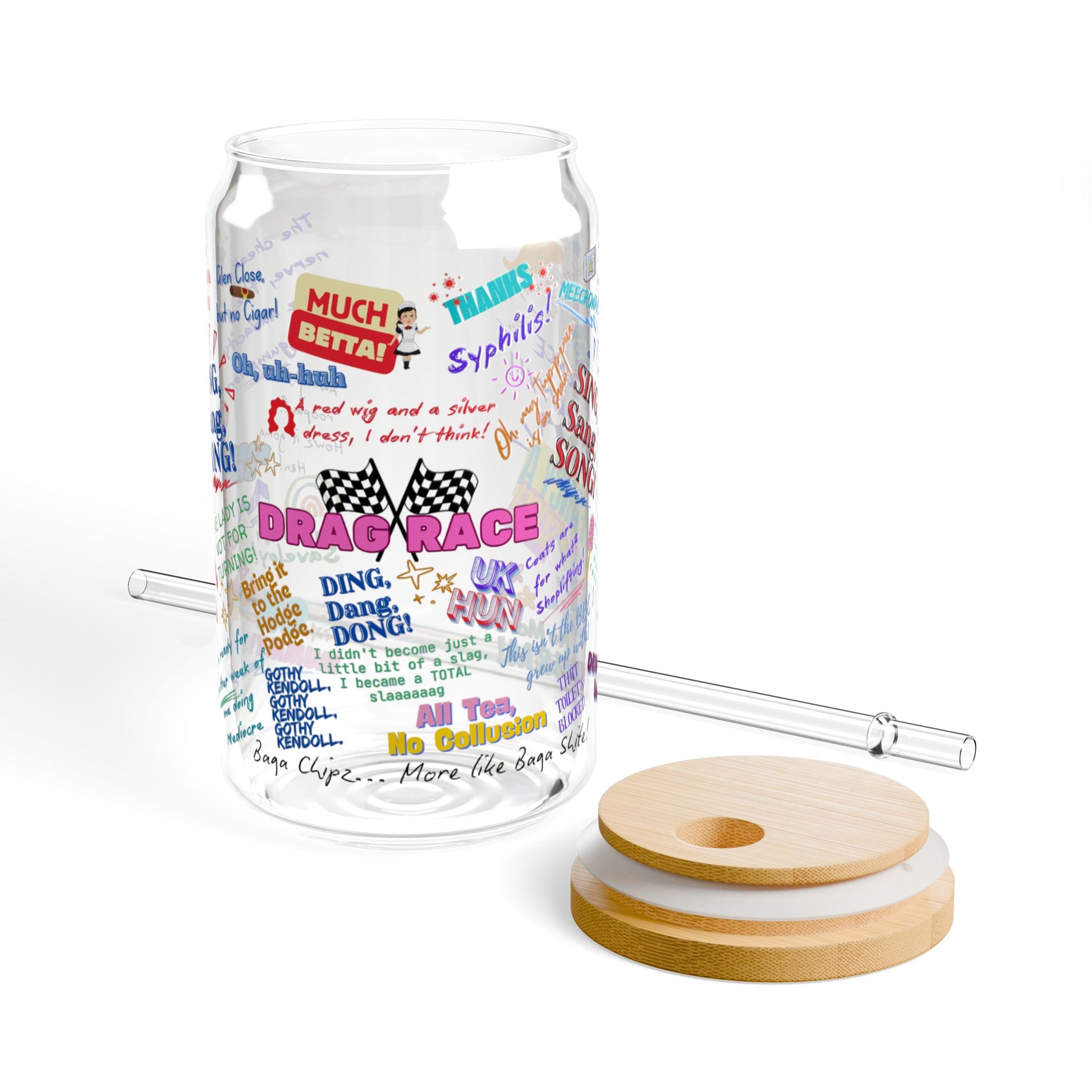 Clear glass tumbler with colorful text design, wooden lid, and straw on a white background Features iconic Quotes from your favorite Drag Race UK  Drag Queens.