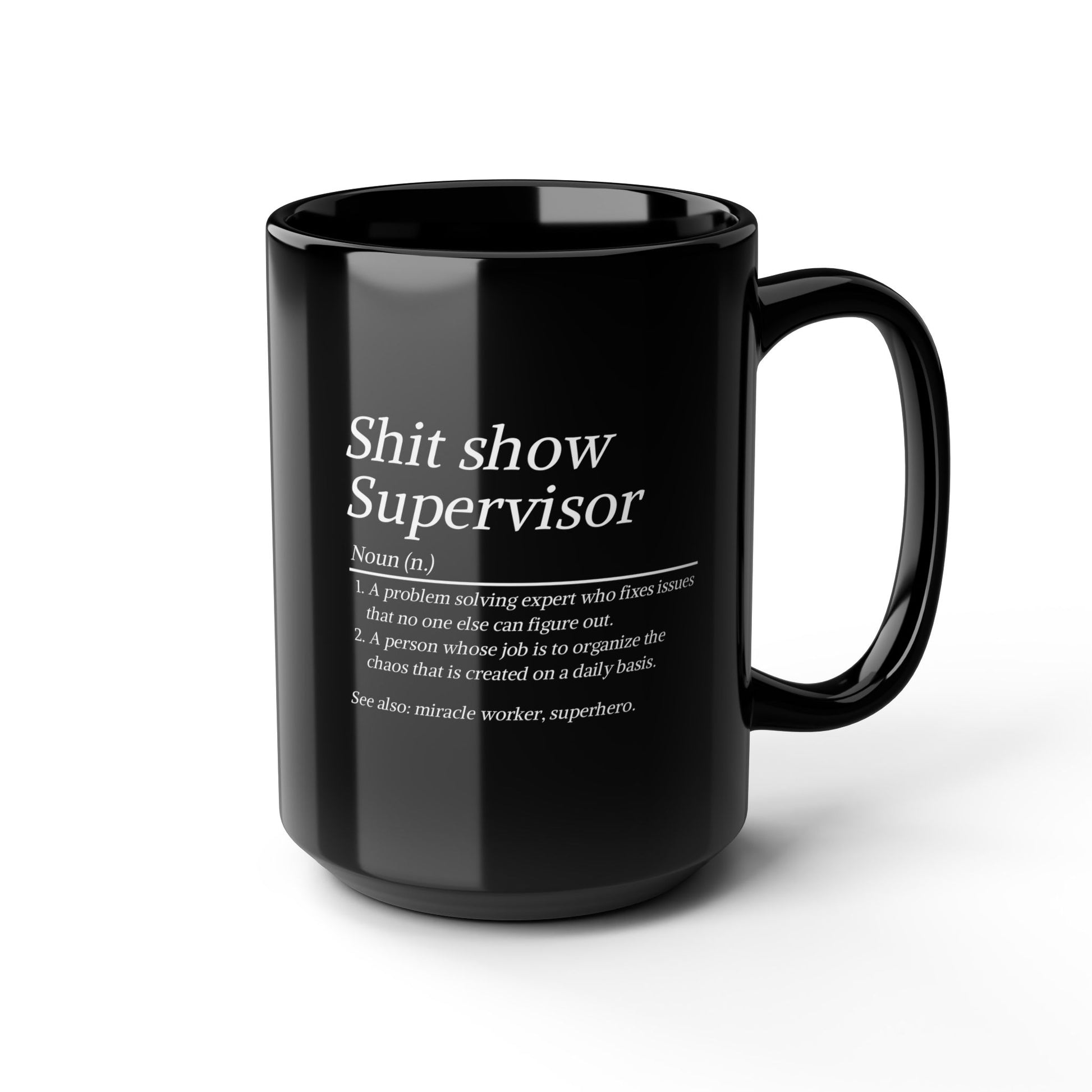 Black mug with white text on a white background