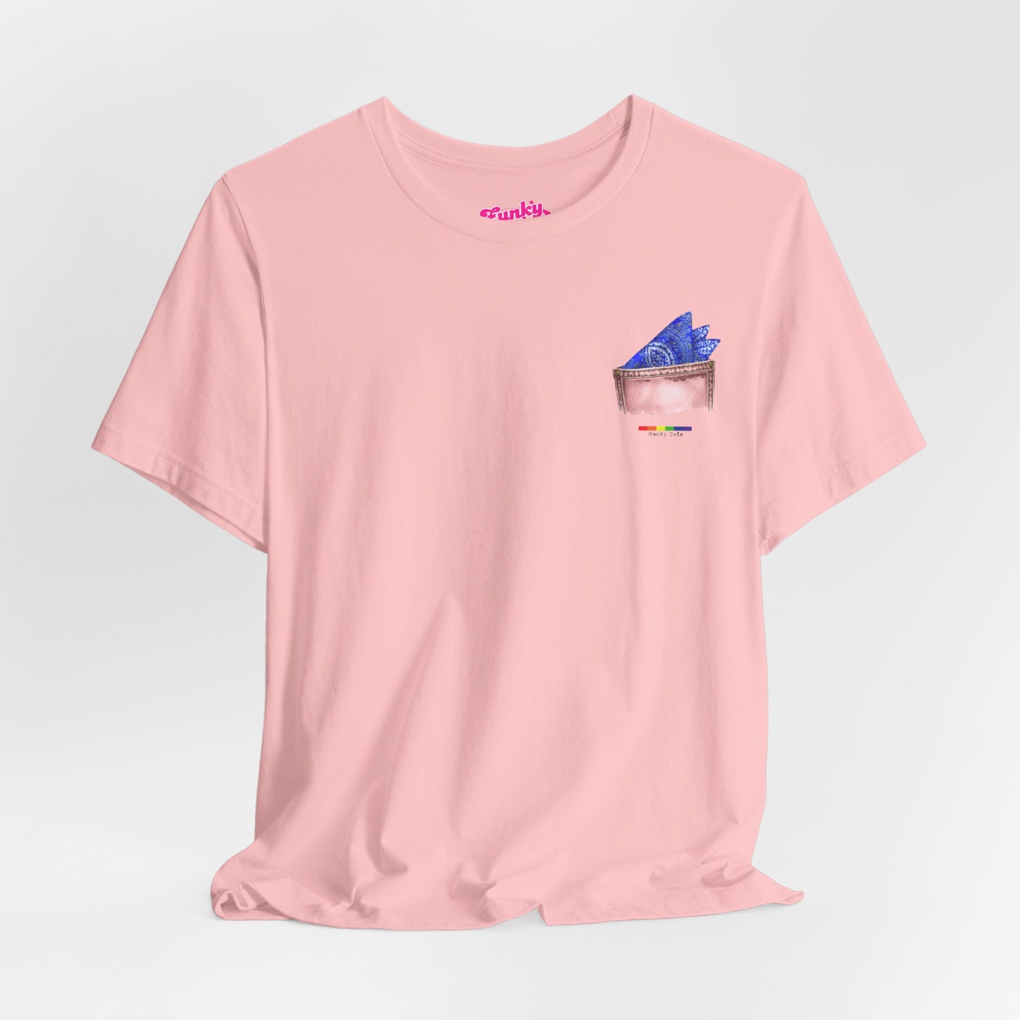 Pink t-shirt with a small graphic of a pocket with a paisley print hanky tucked inside. it features the LGBT rainbow colours and the words Hanky Code