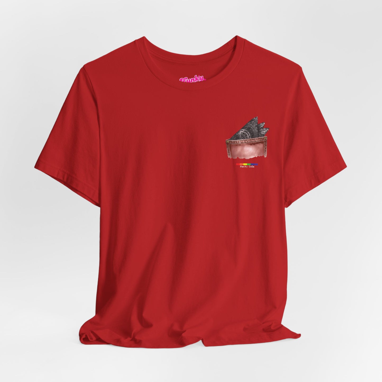 Red t-shirt with a small graphic of a pocket with a paisley print hanky tucked inside. it features the LGBT rainbow colours and the words Hanky Code