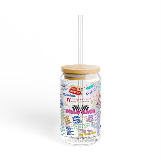 Glass tumbler with colorful text and a wooden lid on a white background. Features iconic Quotes from your favorite Drag Race UK  Drag Queens.