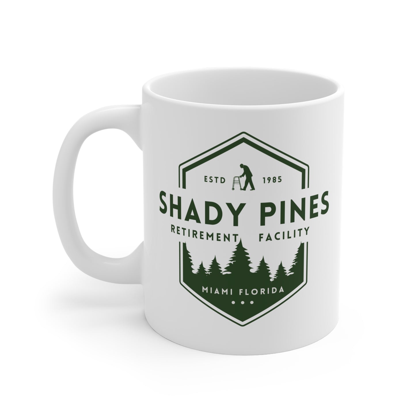 White mug with 'Shady Pines Retirement Facility' design on a white background