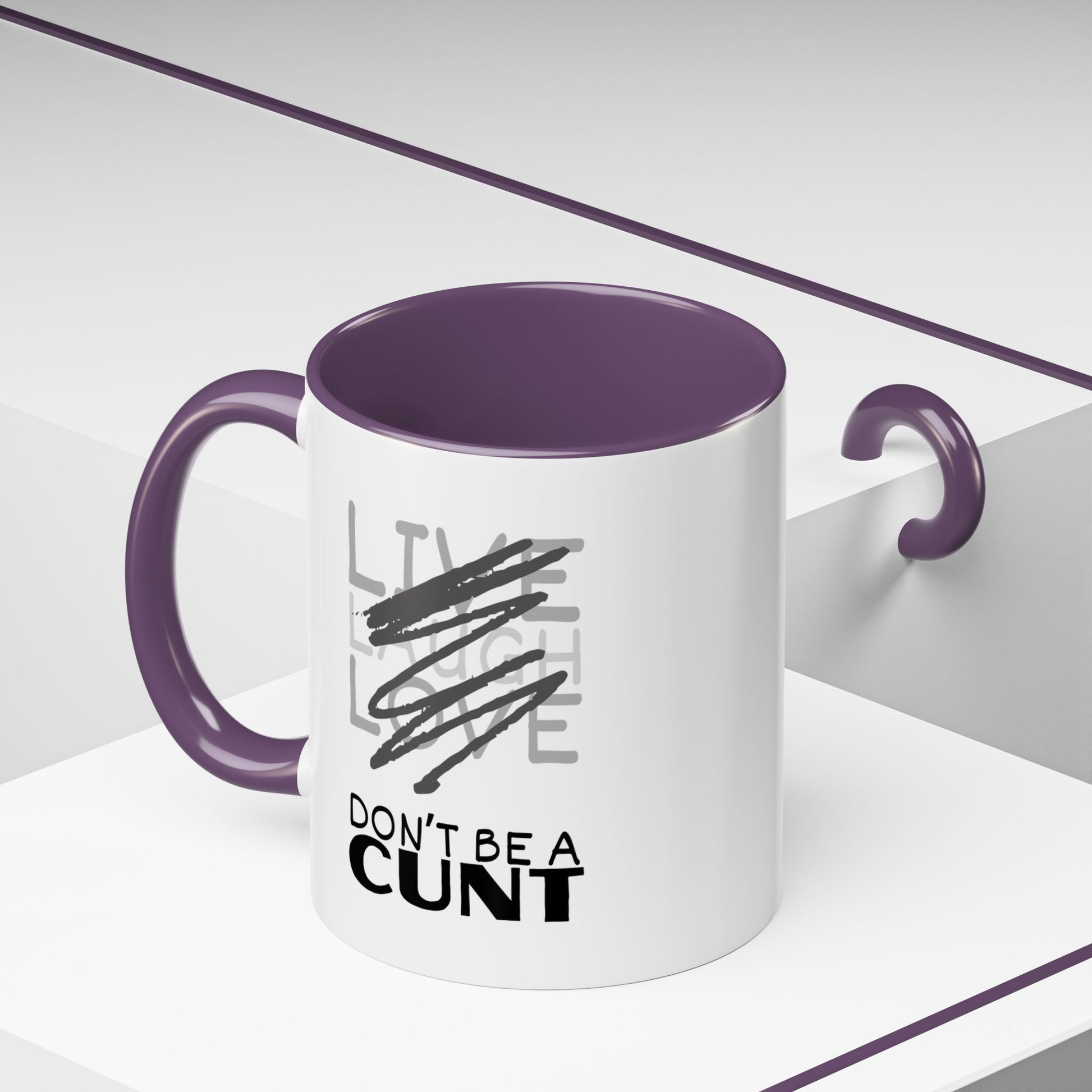Mug with purple interior and handle, featuring text on a white background