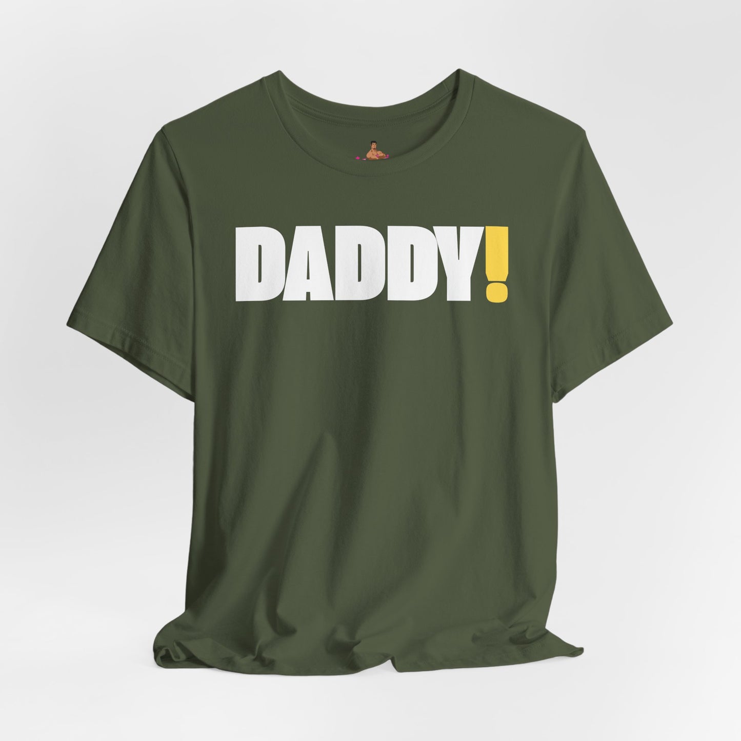 Man wearing a black t-shirt with 'DADDY!' text against a dark background LGBTQIA+ Kink Positive