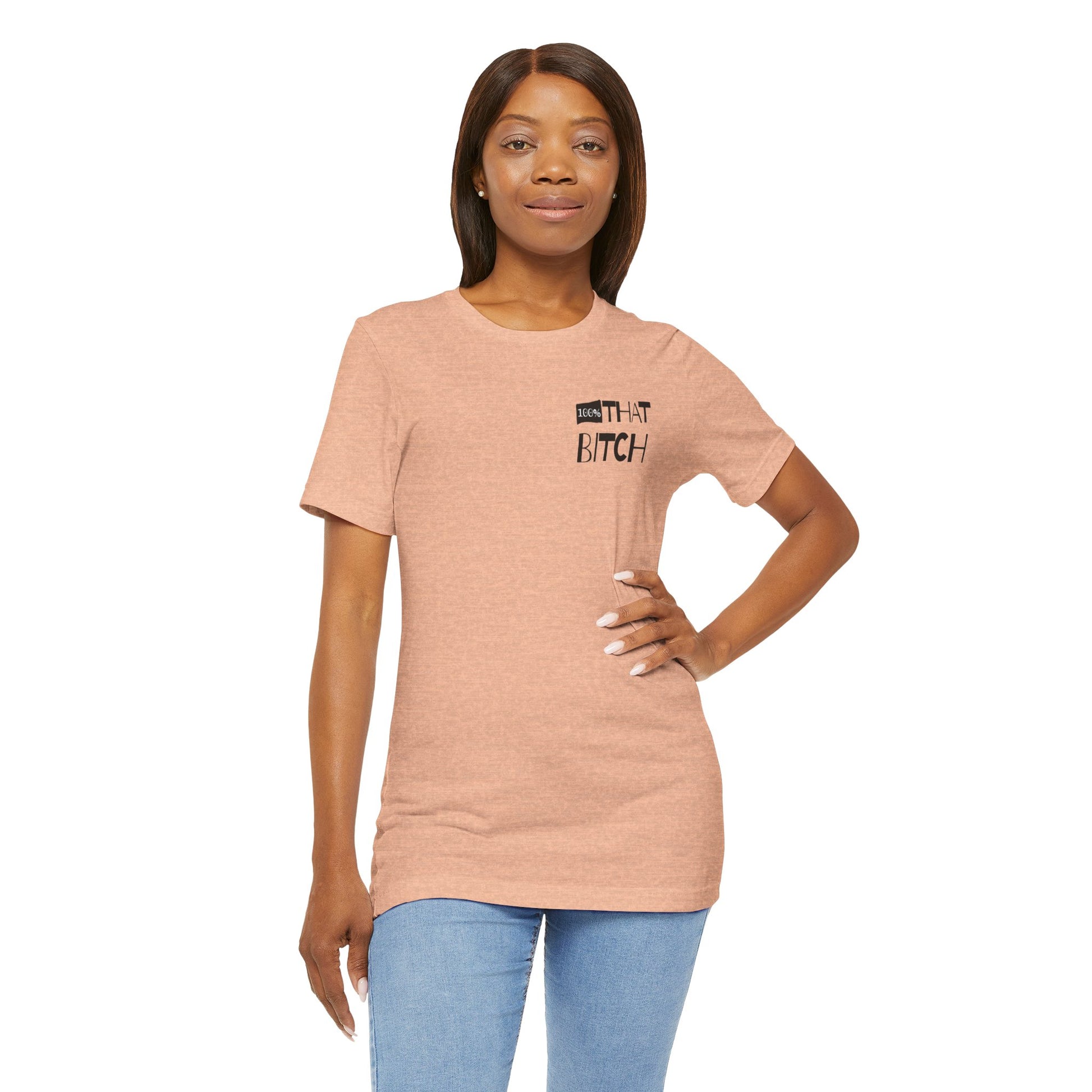 Woman wearing a pink t-shirt with text on a white background  100% that Bitch