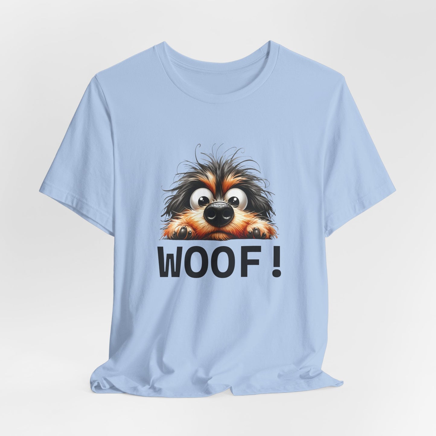 Light blue t-shirt with a dog graphic and 'WOOF!' text on a light gray background
