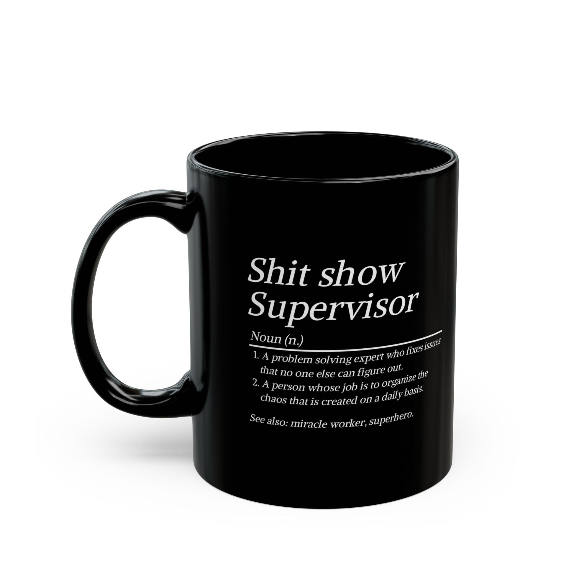Black mug with white text definition on a white background