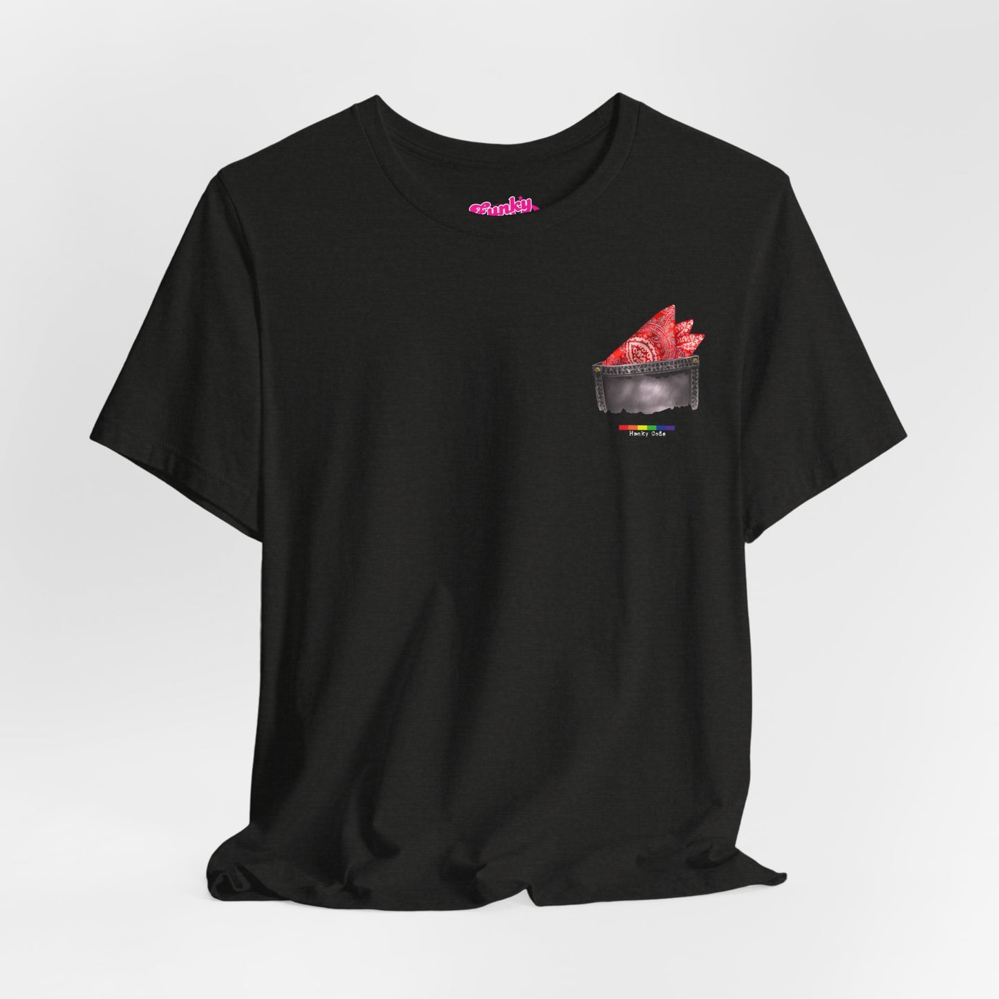 Black t-shirt with a small graphic of a pocket with a paisley print hanky tucked inside. it features the LGBT rainbow colours and the words Hanky Code