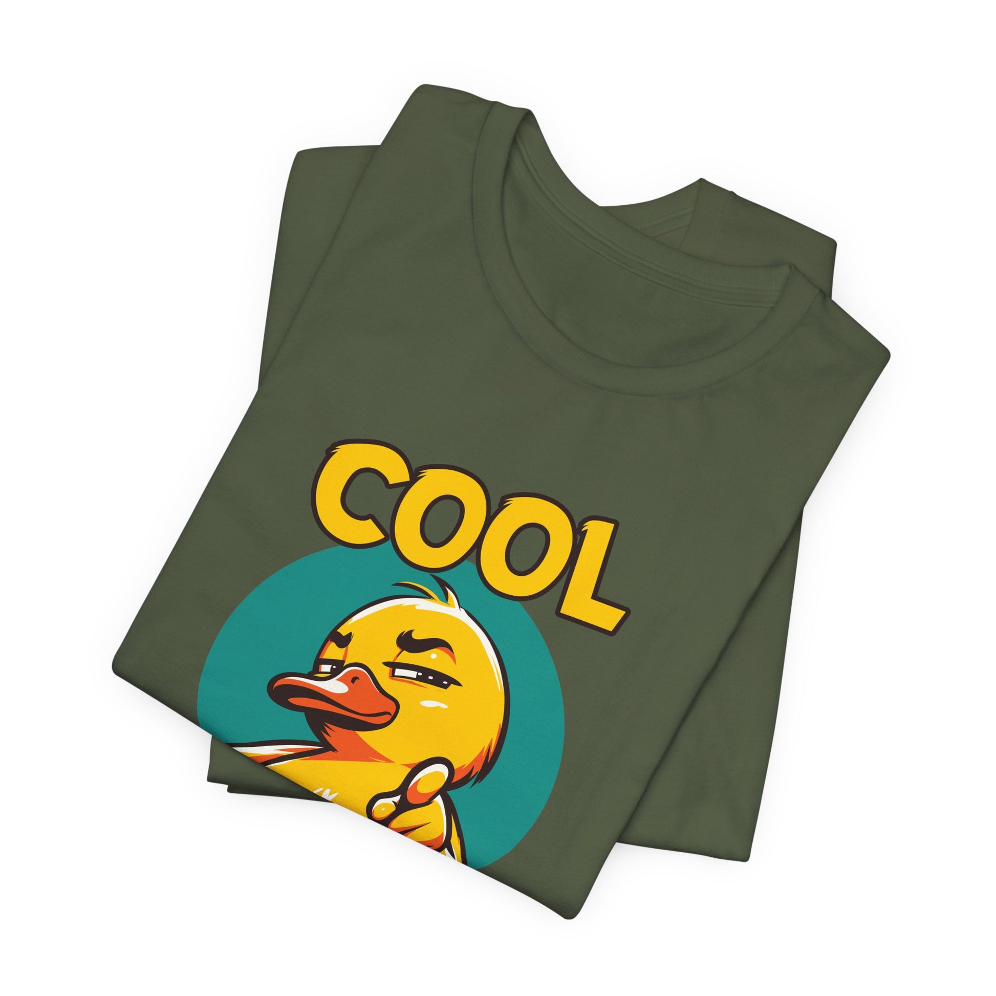 Folded green t-shirt with a yellow duck and 'COOL' text on a white background