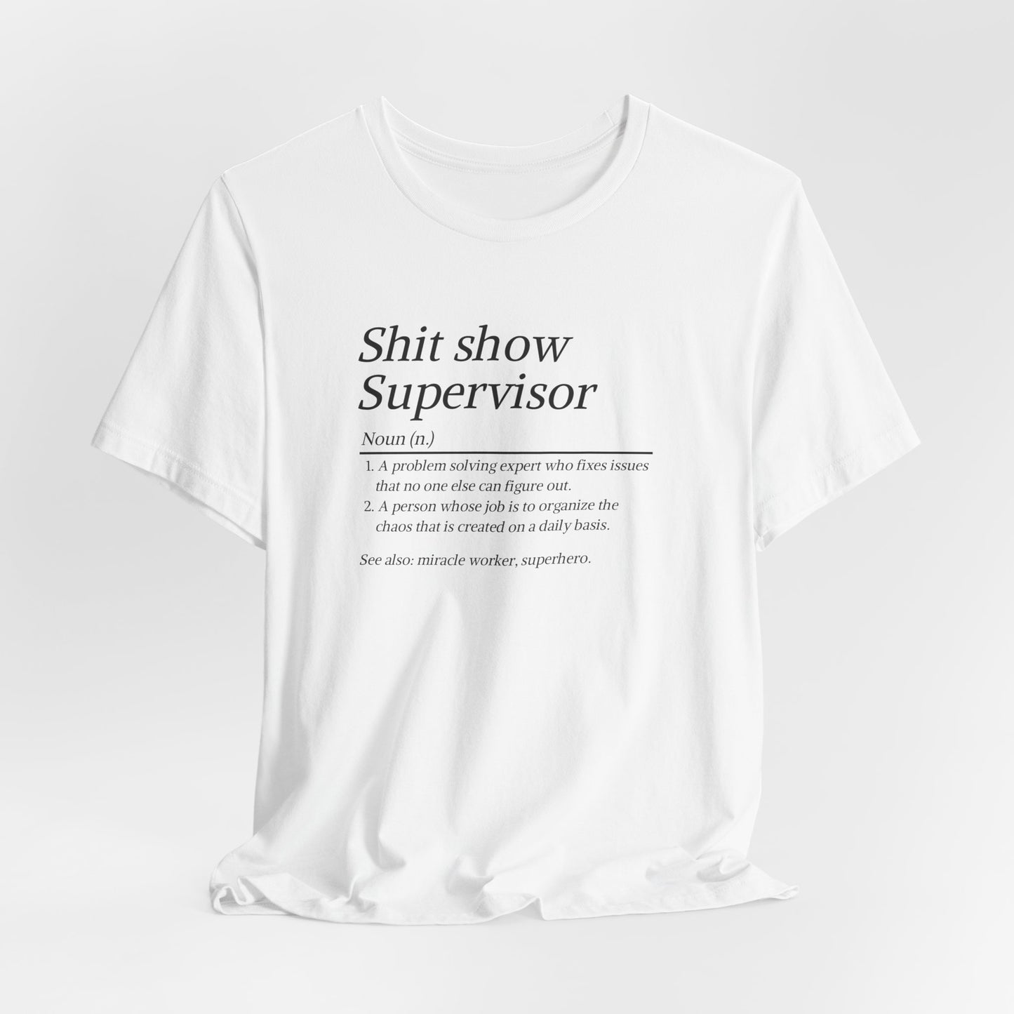 White t-shirt with black text on a white background