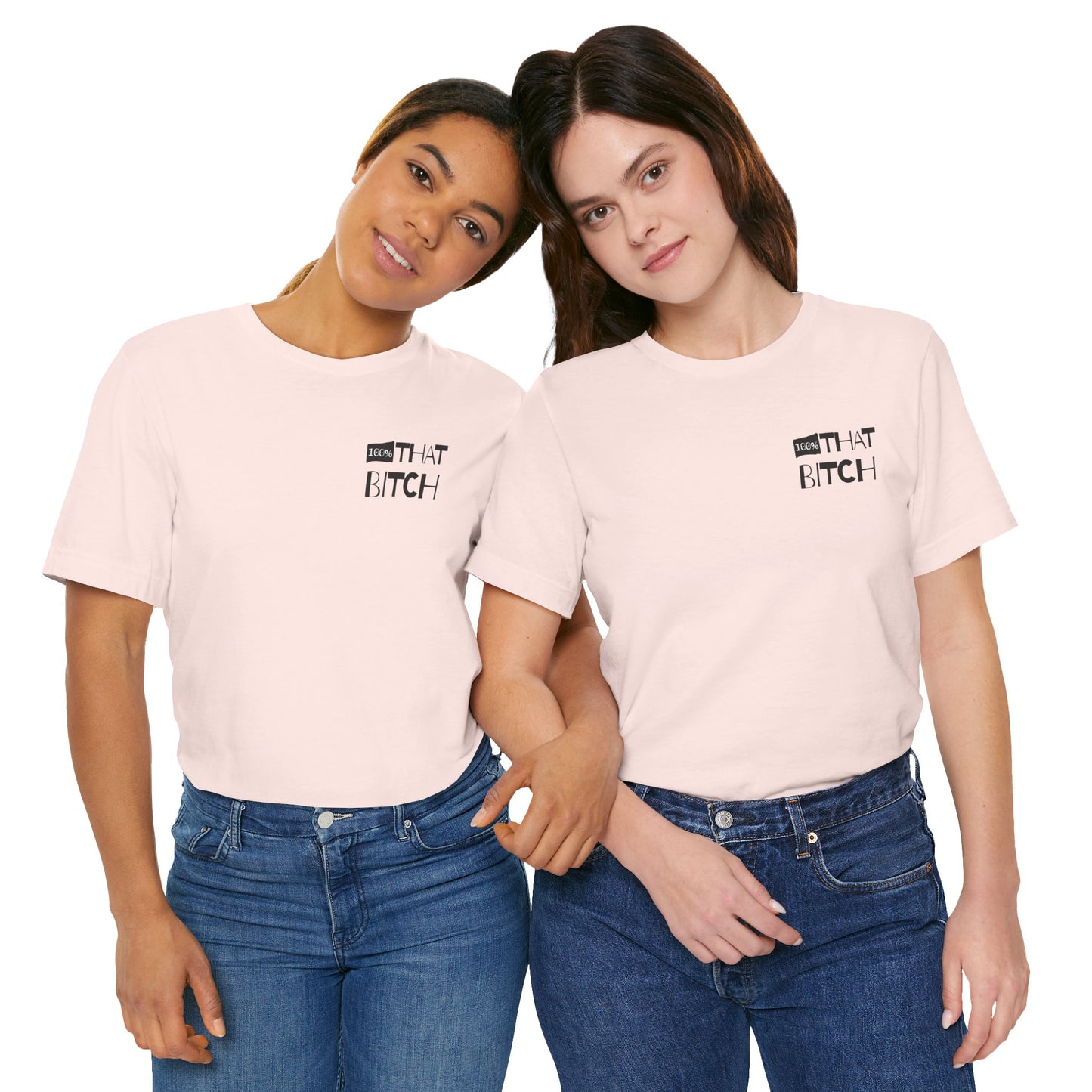 Two women wearing matching light pink t-shirts with text on a white background  100% that Bitch