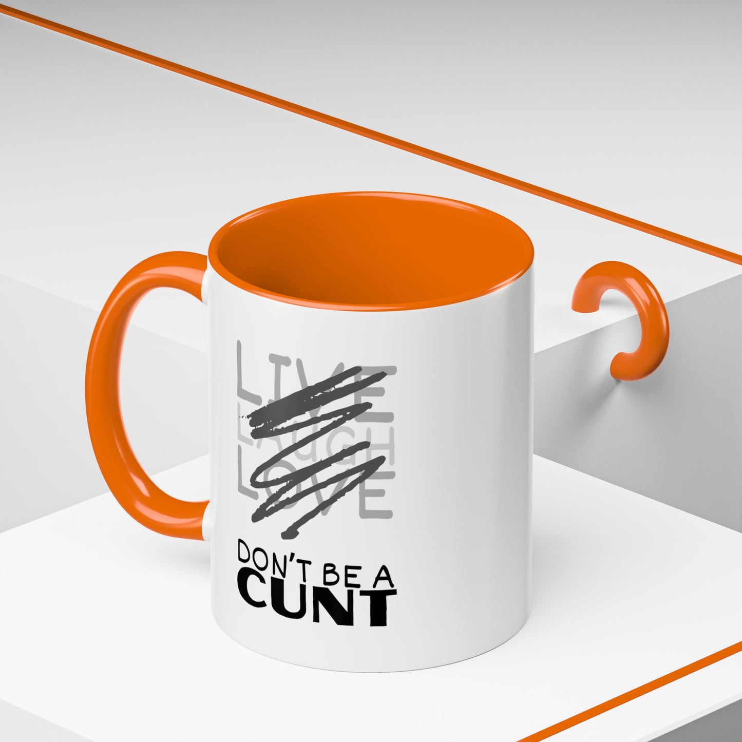Mug with orange interior and handle on a white background