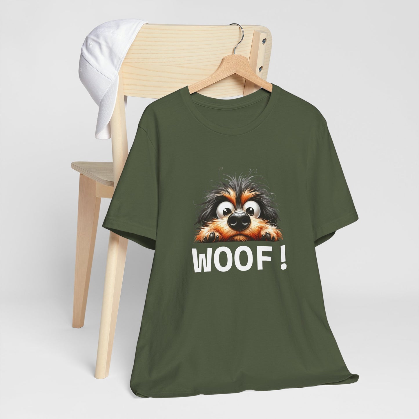 Green t-shirt with a dog graphic and 'WOOF!' text on a white background