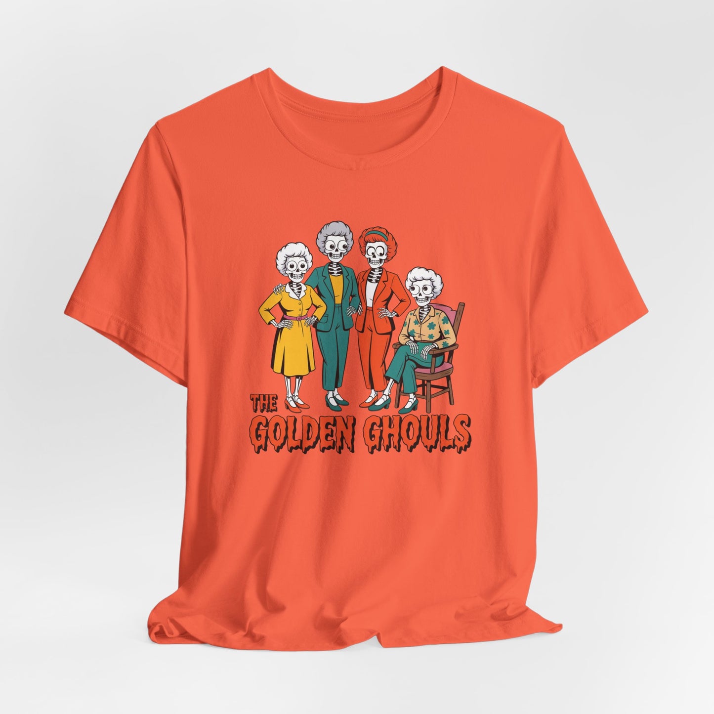 Orange t-shirt with 'The Golden Ghouls' graphic design on a white background   Golden Girls, 80s TV, Halloween Tees