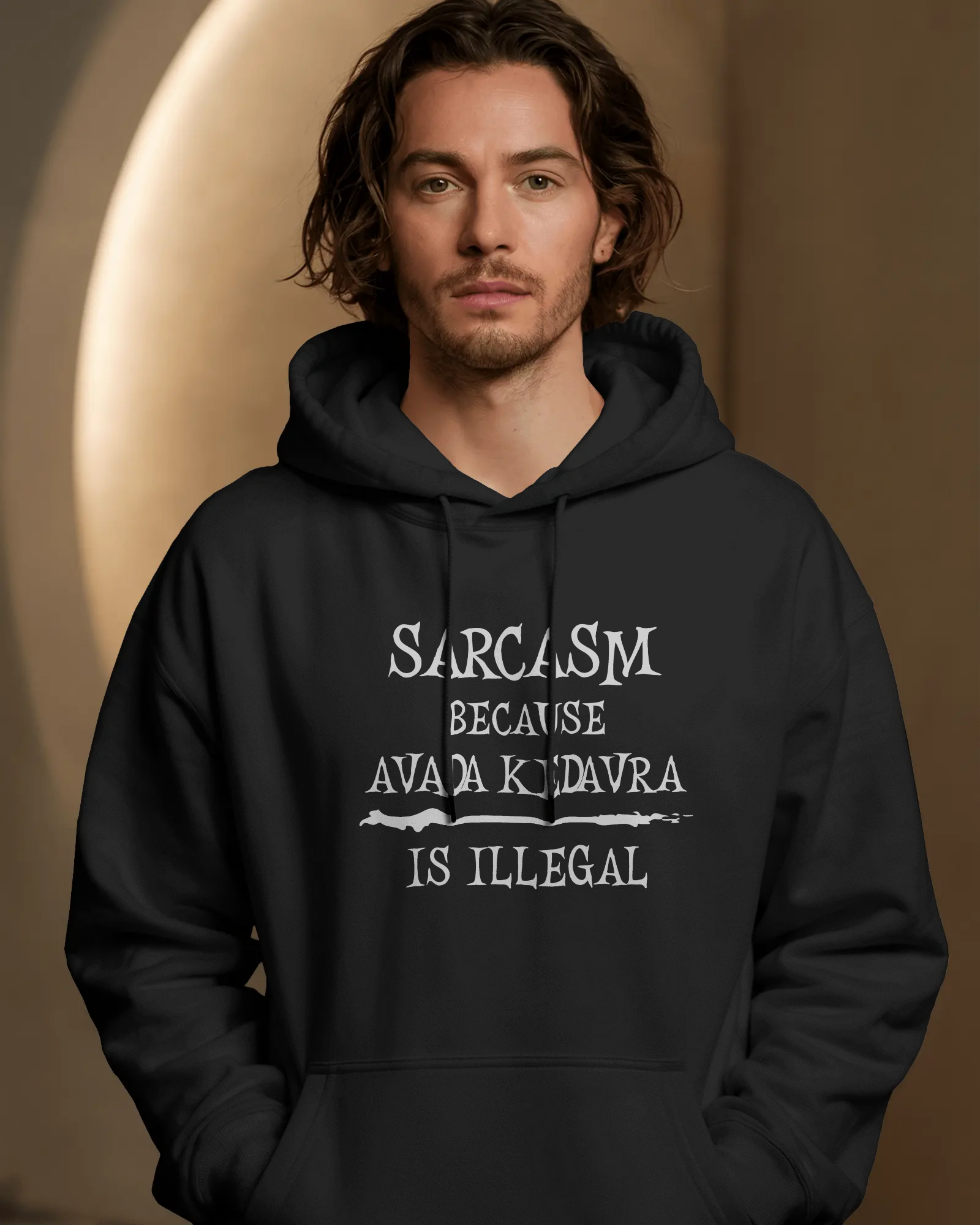 Person wearing a black hoodie with text in front of a gold circular object on a brown background  Sarcasm, Sarcastic Humor, Harry Potter, potterhead, avada kedavra
