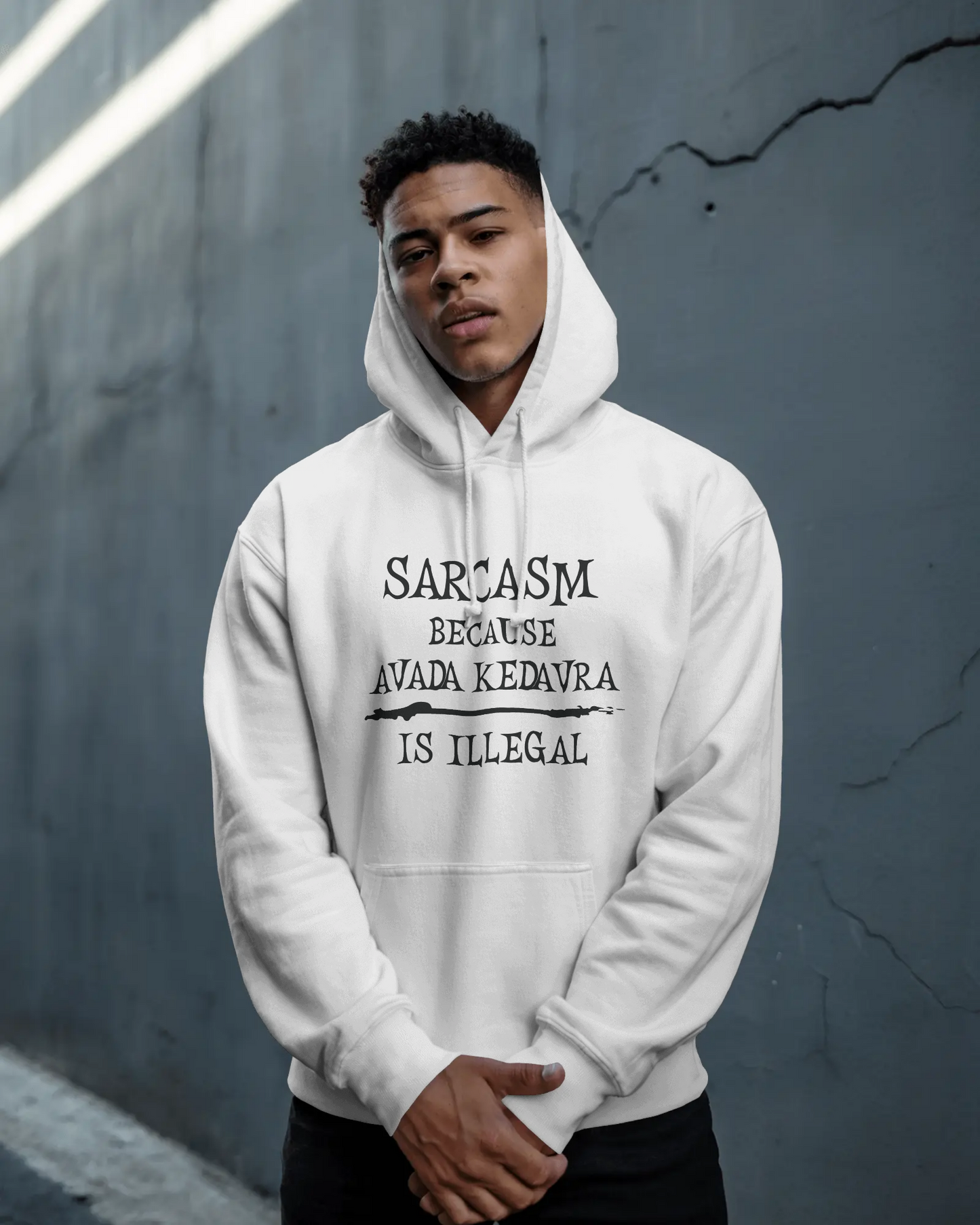 Person wearing a white hoodie with text against a gray wall  Sarcasm, Sarcastic Humor, Harry Potter, potterhead, avada kedavra