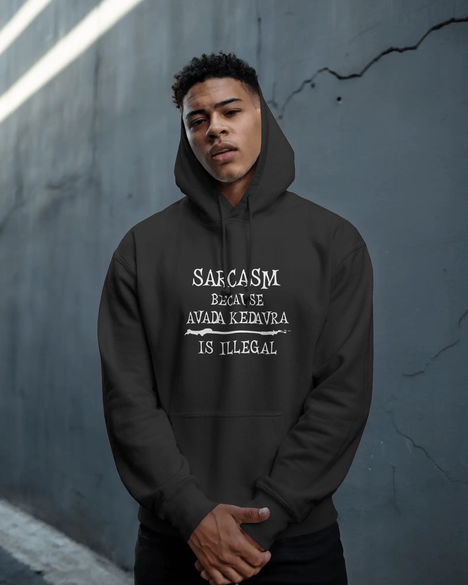 Person wearing a black hoodie with text against a gray wall  Sarcasm, Sarcastic Humor, Harry Potter, potterhead, avada kedavra