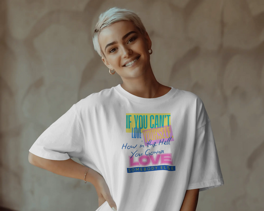 Person wearing a white t-shirt with colorful text design against a neutral background, Drag Race, Rupaul's drag race, Rupaul, If you can;t love yourself, self love, lgbt, queer culture, Gay