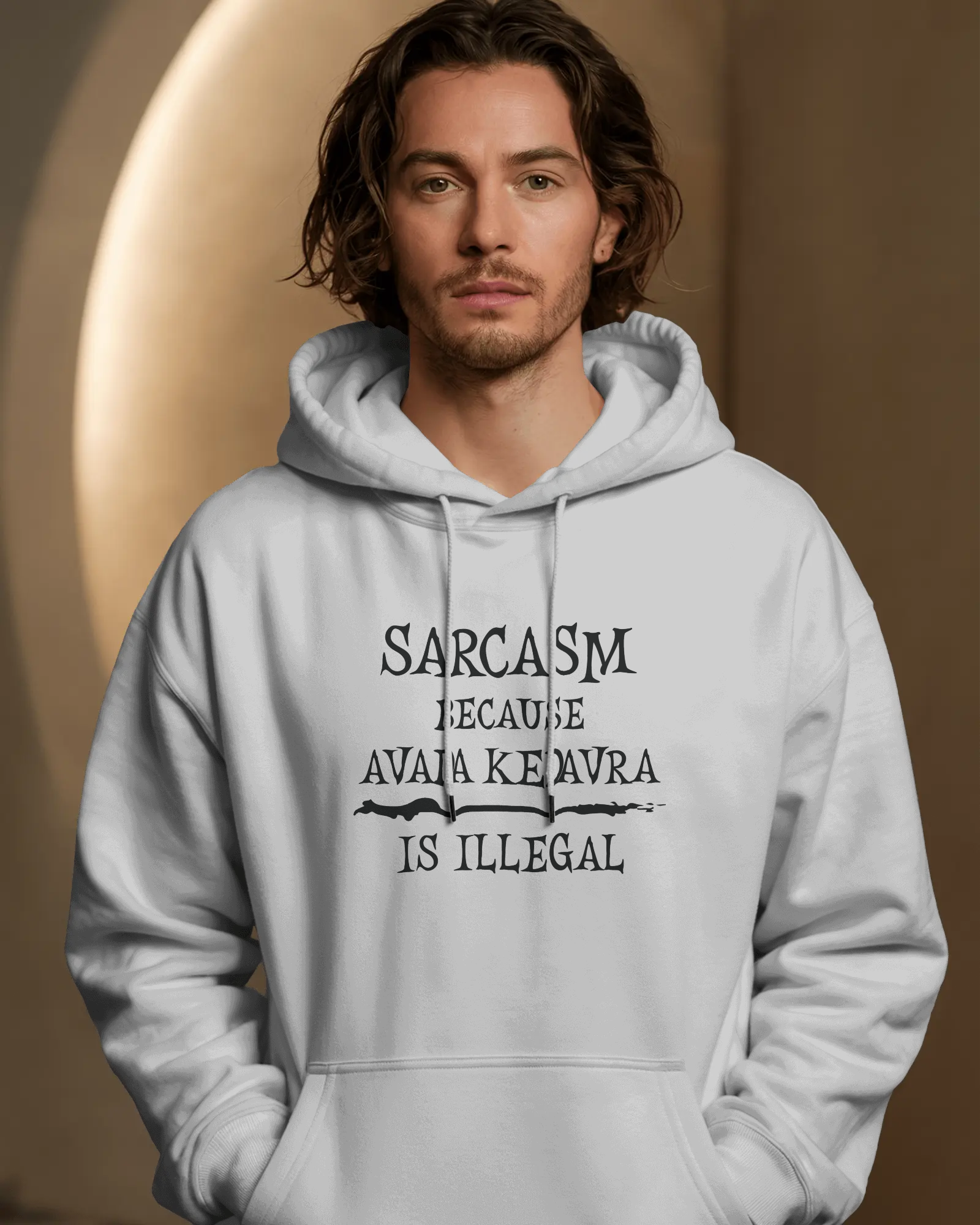 Man wearing a light gray hoodie with text design on a beige background  Sarcasm, Sarcastic Humor, Harry Potter, potterhead, avada kedavra
