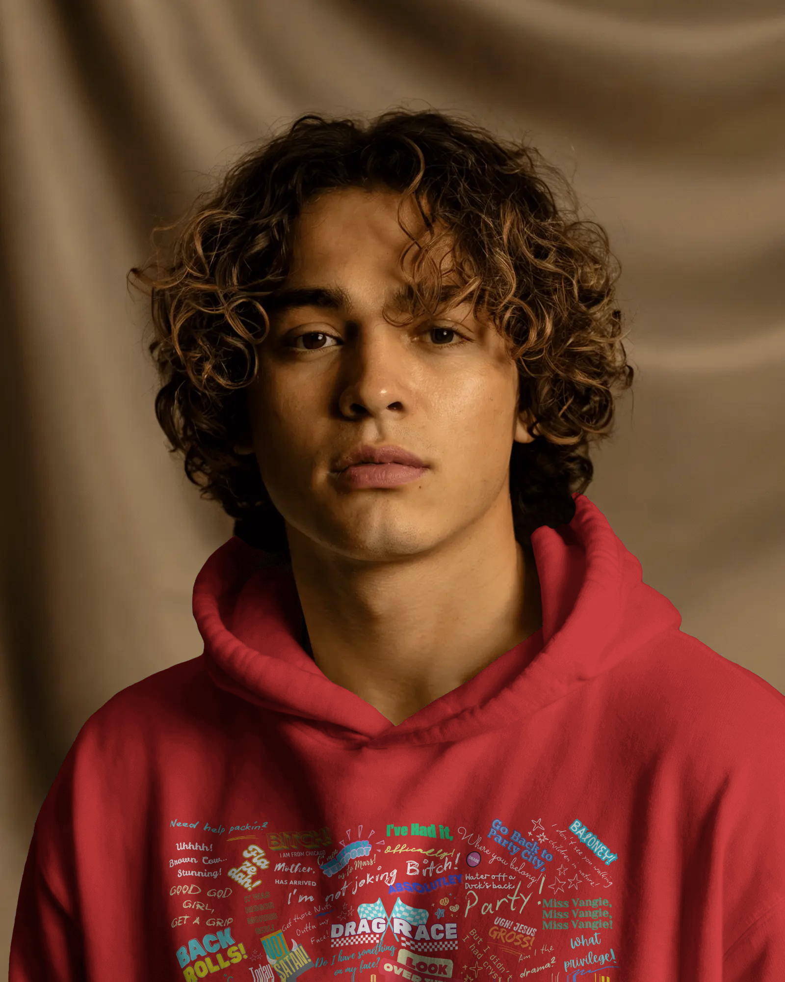 Person wearing a red hoodie with text against a brown background  Drag race, Rupaul, Rupaul's Drag Race UK, LGBT, Queer Culture, Gay, Drag Queen