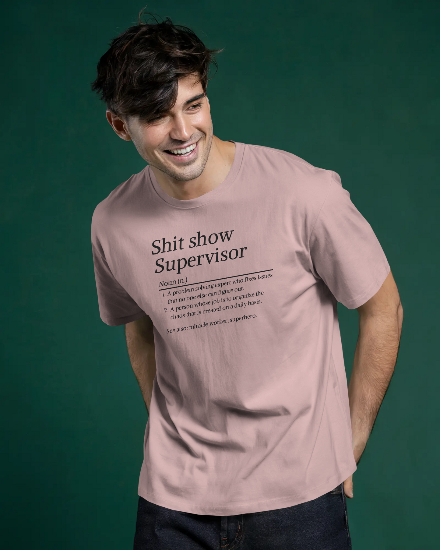 Man wearing a t-shirt with text design on a green background