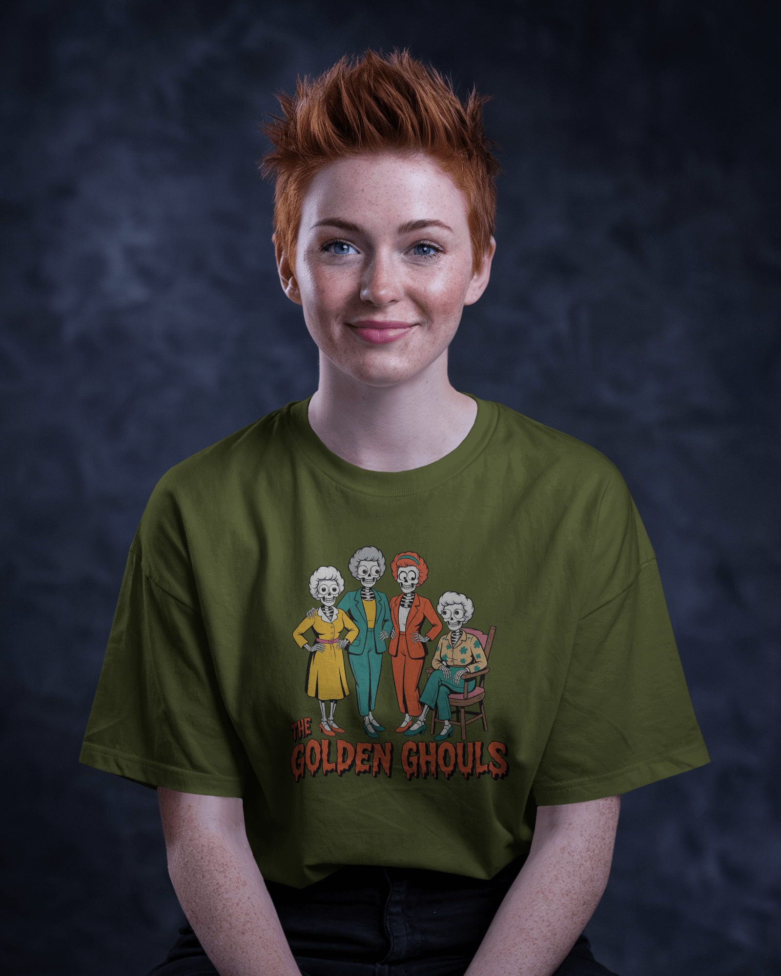 Person wearing a green t-shirt with 'The Golden Ghoul' design against a dark background   Golden Girls, 80s TV, Halloween Tees