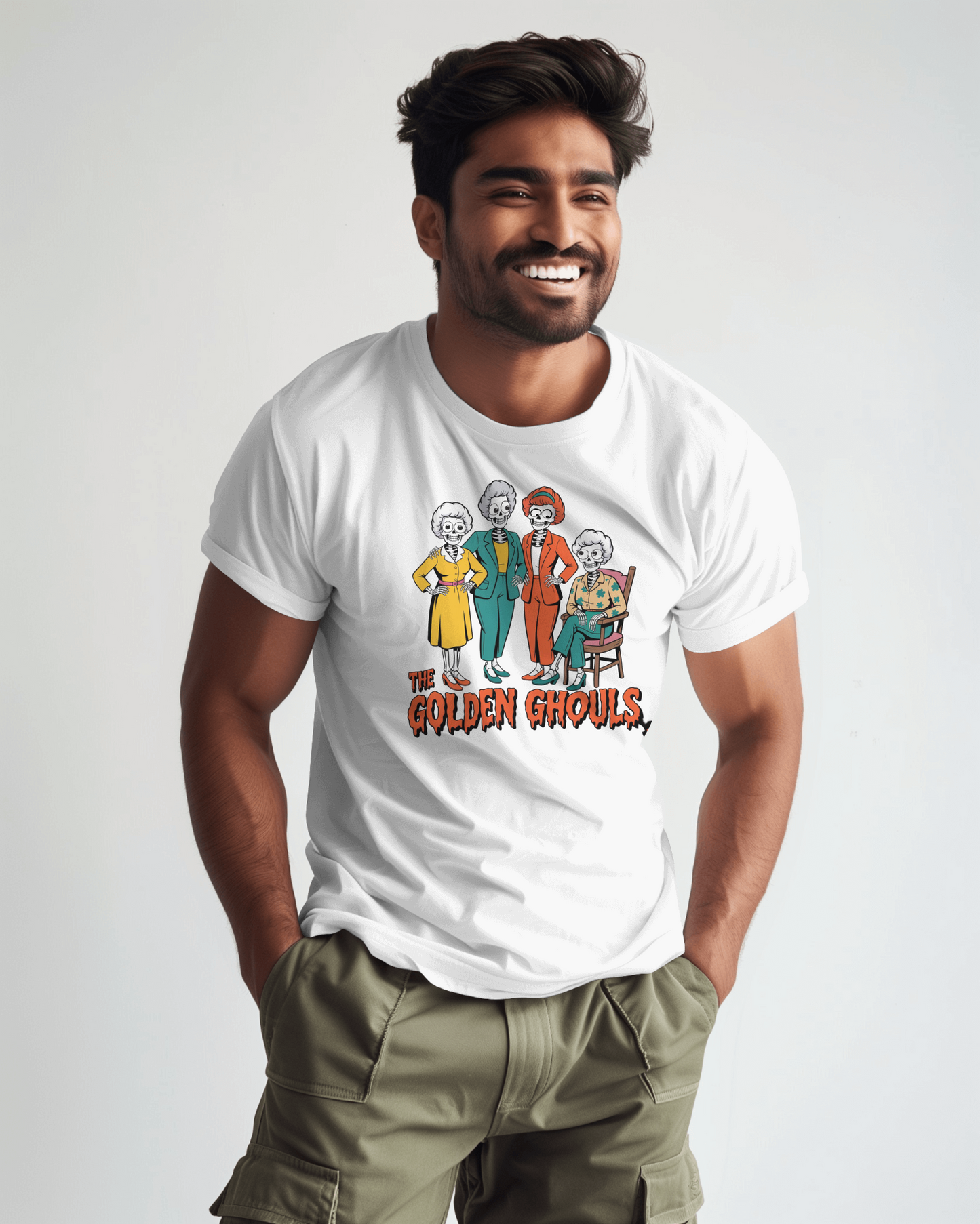 Man wearing a white t-shirt with 'The Golden Girls' graphic design on a plain background   Golden Girls, 80s TV, Halloween Tees