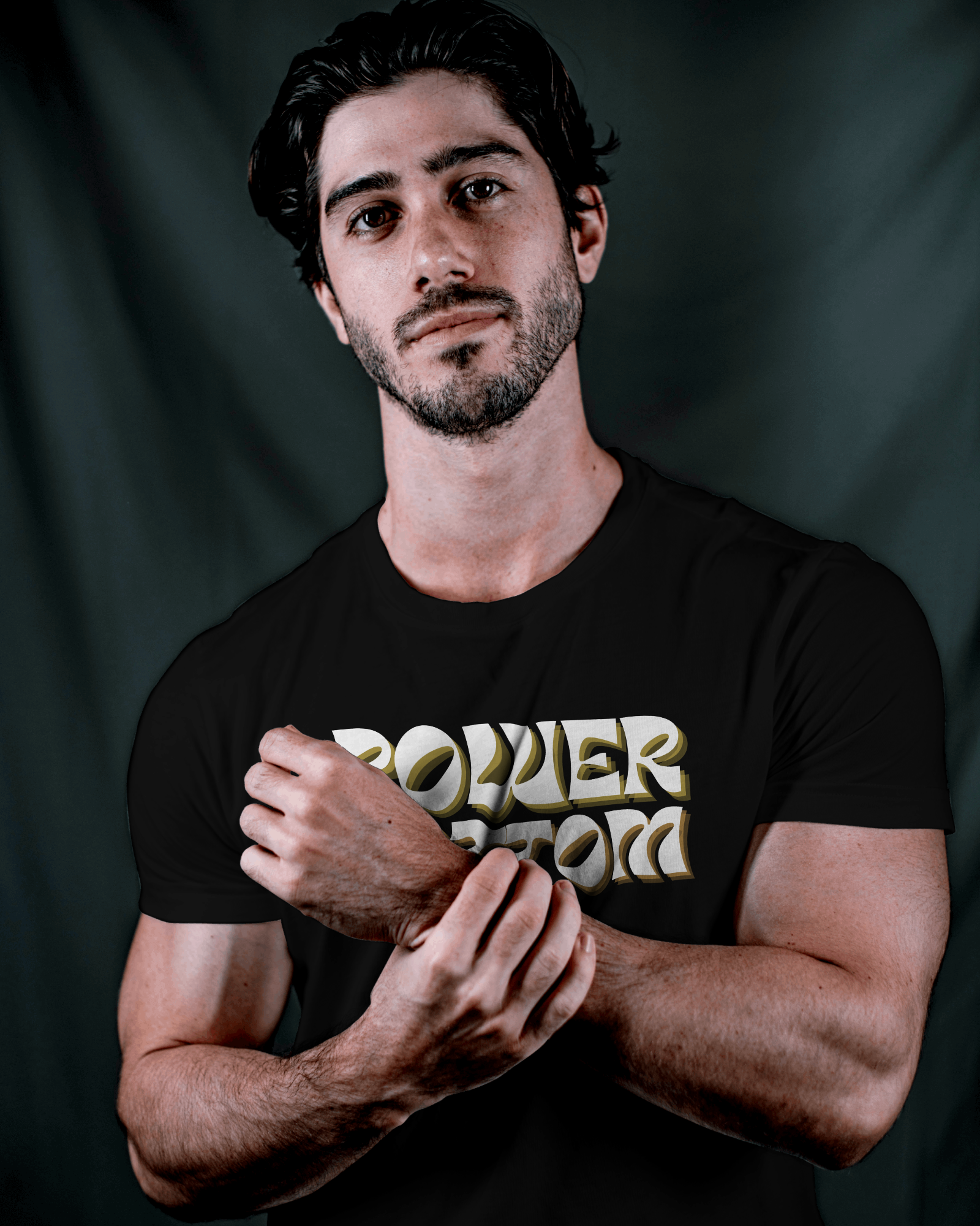 Man wearing a black t-shirt with 'POWER BEAST' text on a dark backgroundKink, LGBTQIA+, Queer Sub Dom 