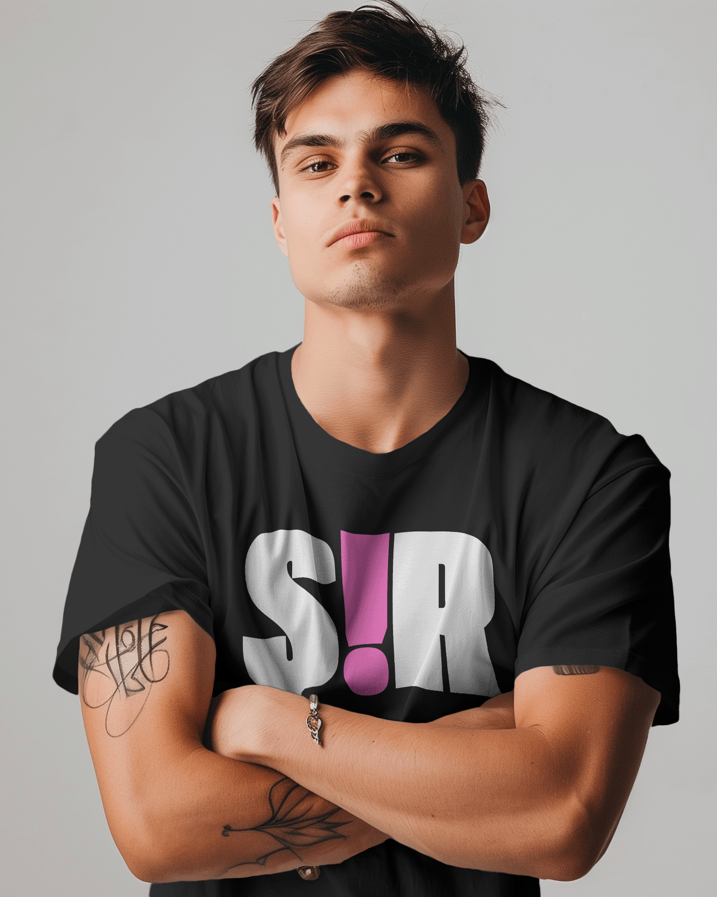 Man wearing a black t-shirt with a colorful logo on a gray background Kink, LGBTQIA+, Queer Sub Dom