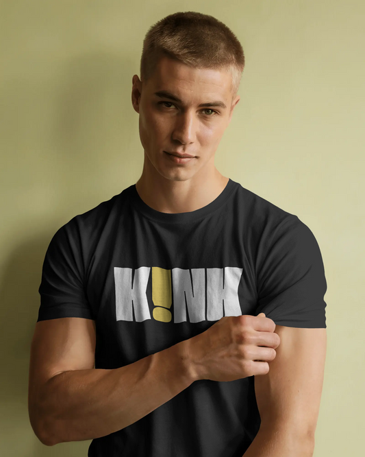 Man wearing a black t-shirt with a logo on a beige background.  Kink, LGBTQIA+, Queer
