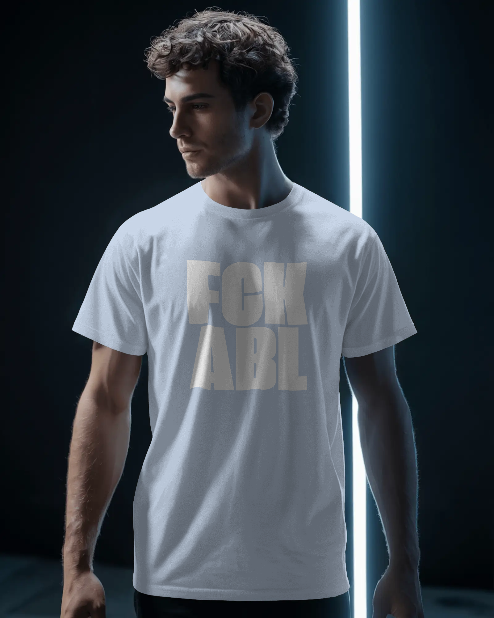Man wearing a white t-shirt with 'FCK ABL' printed on it against a dark background