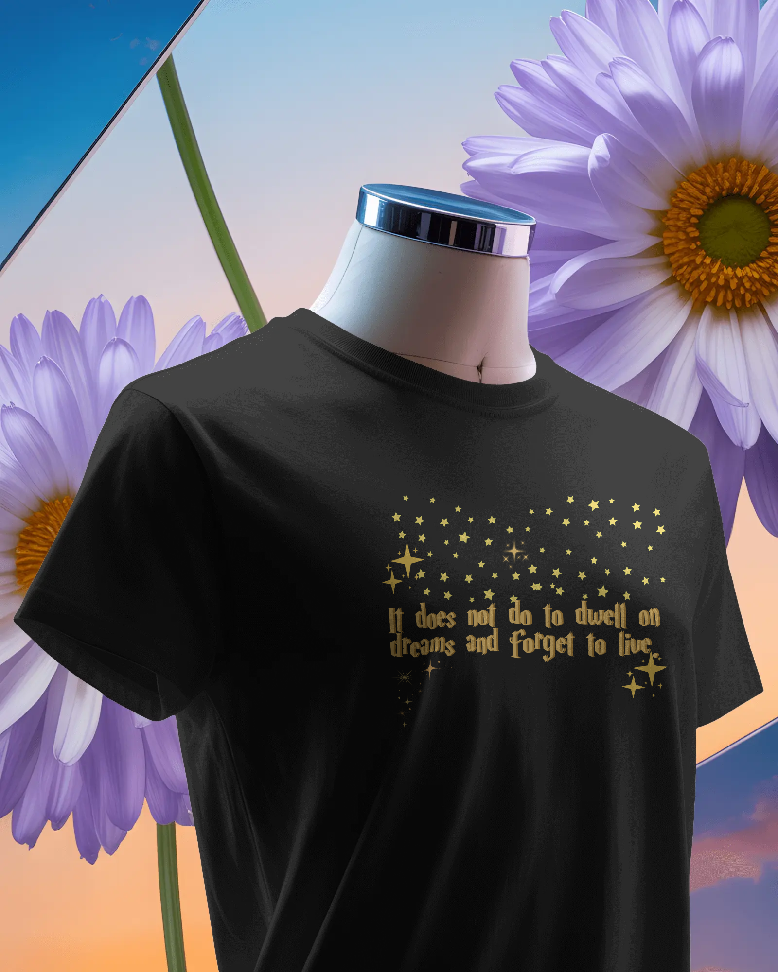 Black t-shirt with gold text and star design on a mannequin against a colorful floral background, Dumbledore quote, harry potter
