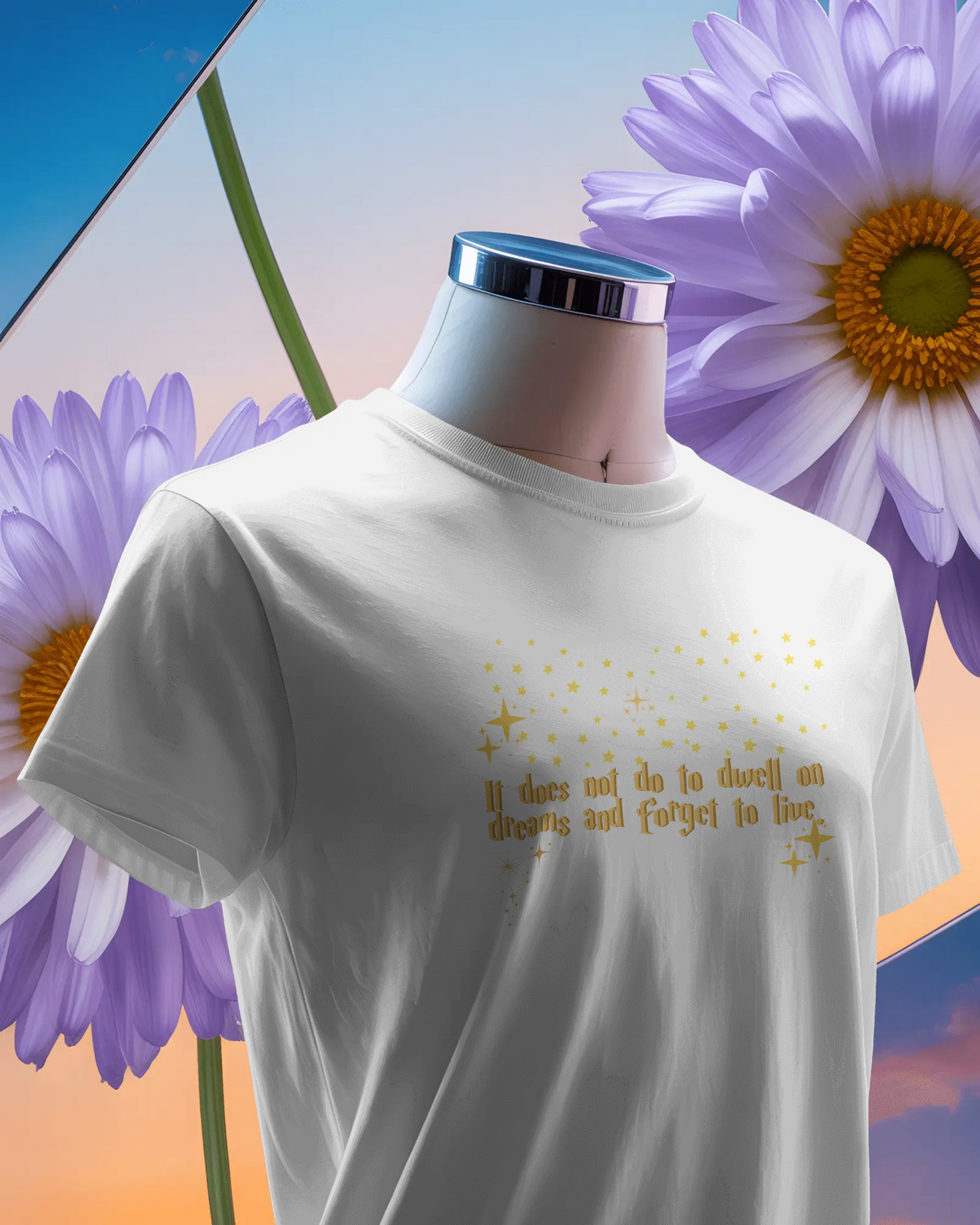 White t-shirt with gold text on a mannequin against a colorful floral background, Dumbledore quote, harry potter