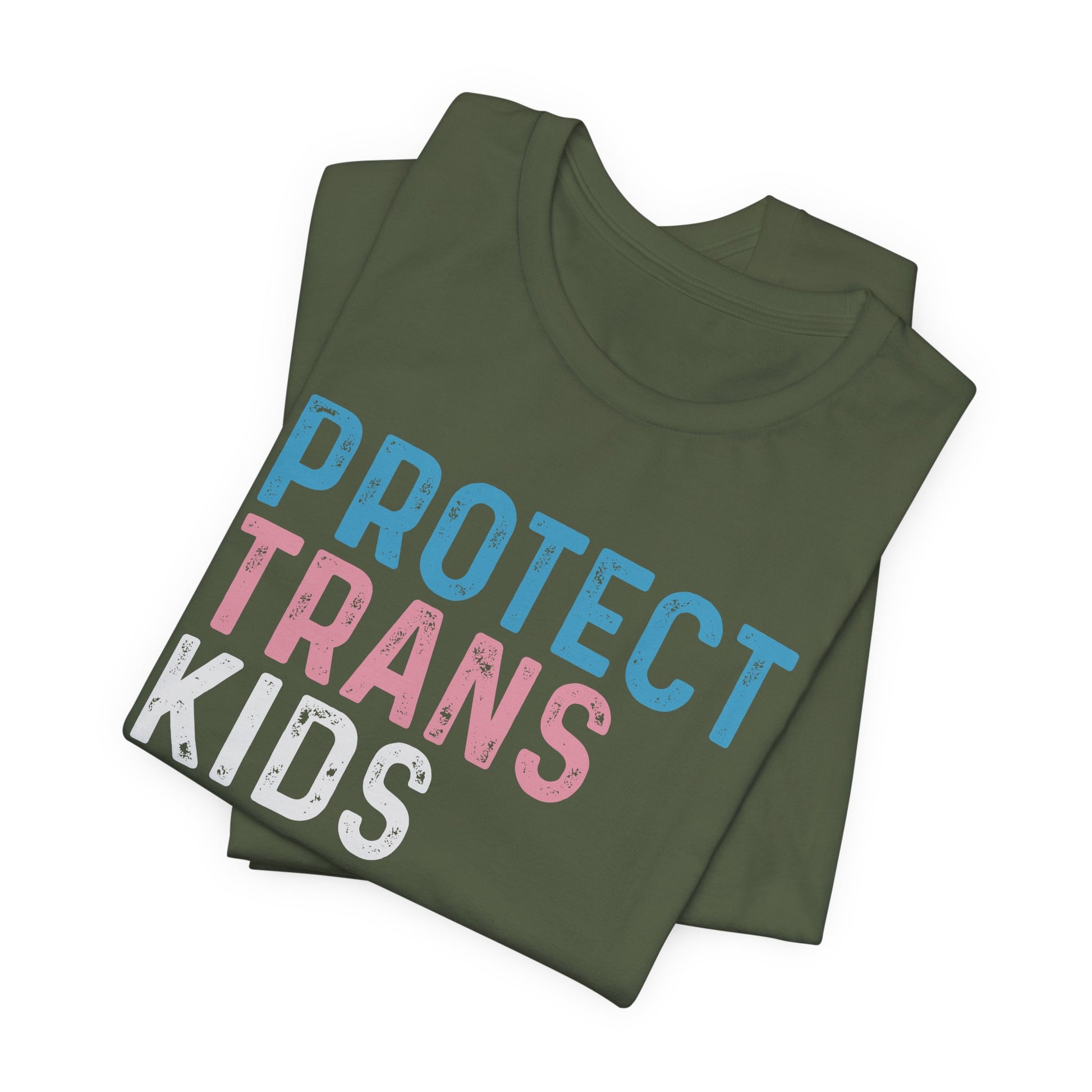 Folded green t-shirt with 'PROTECT TRANS KIDS' text on a white background LGBTQIA+, Queer, Trans rights