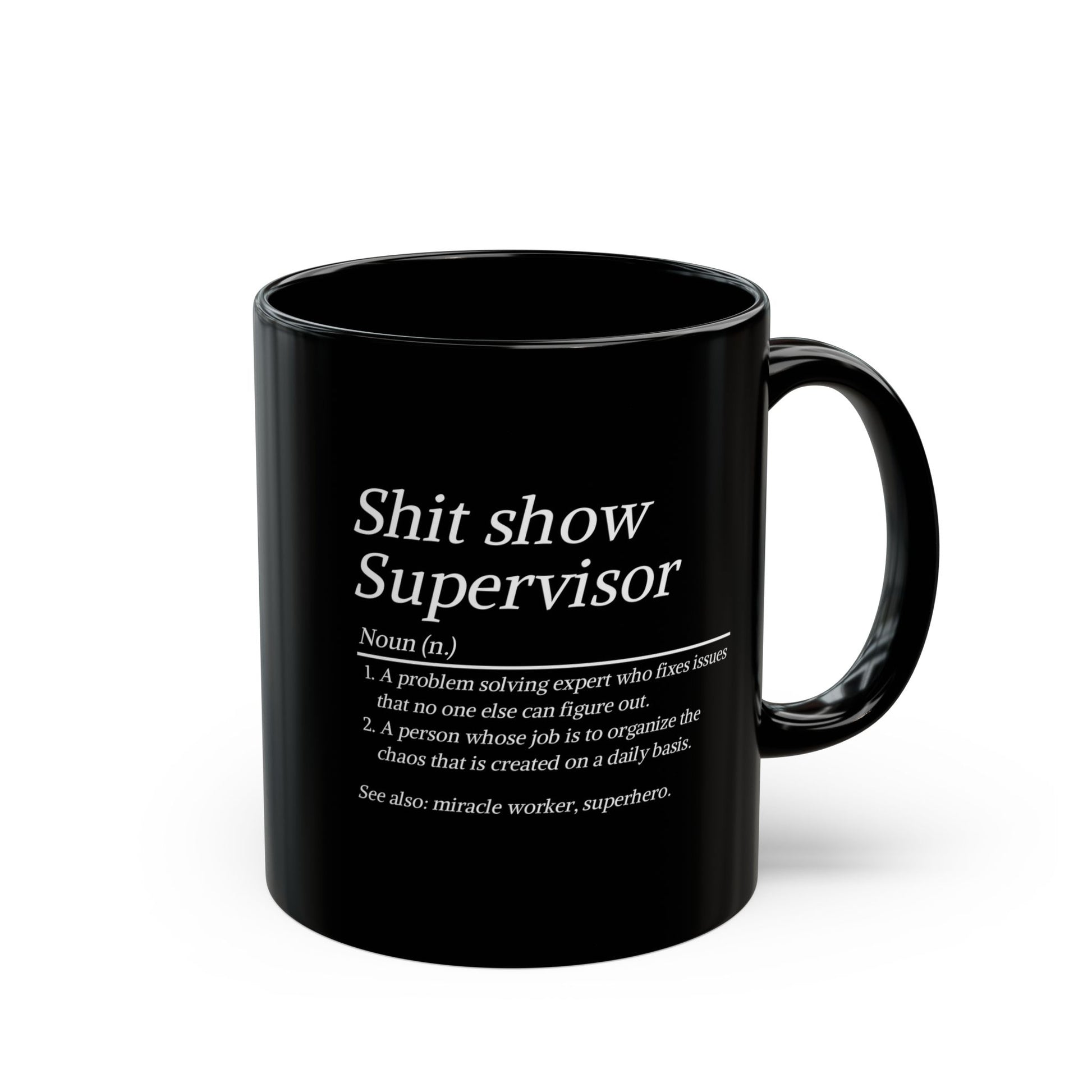 Black mug with white text on a white background