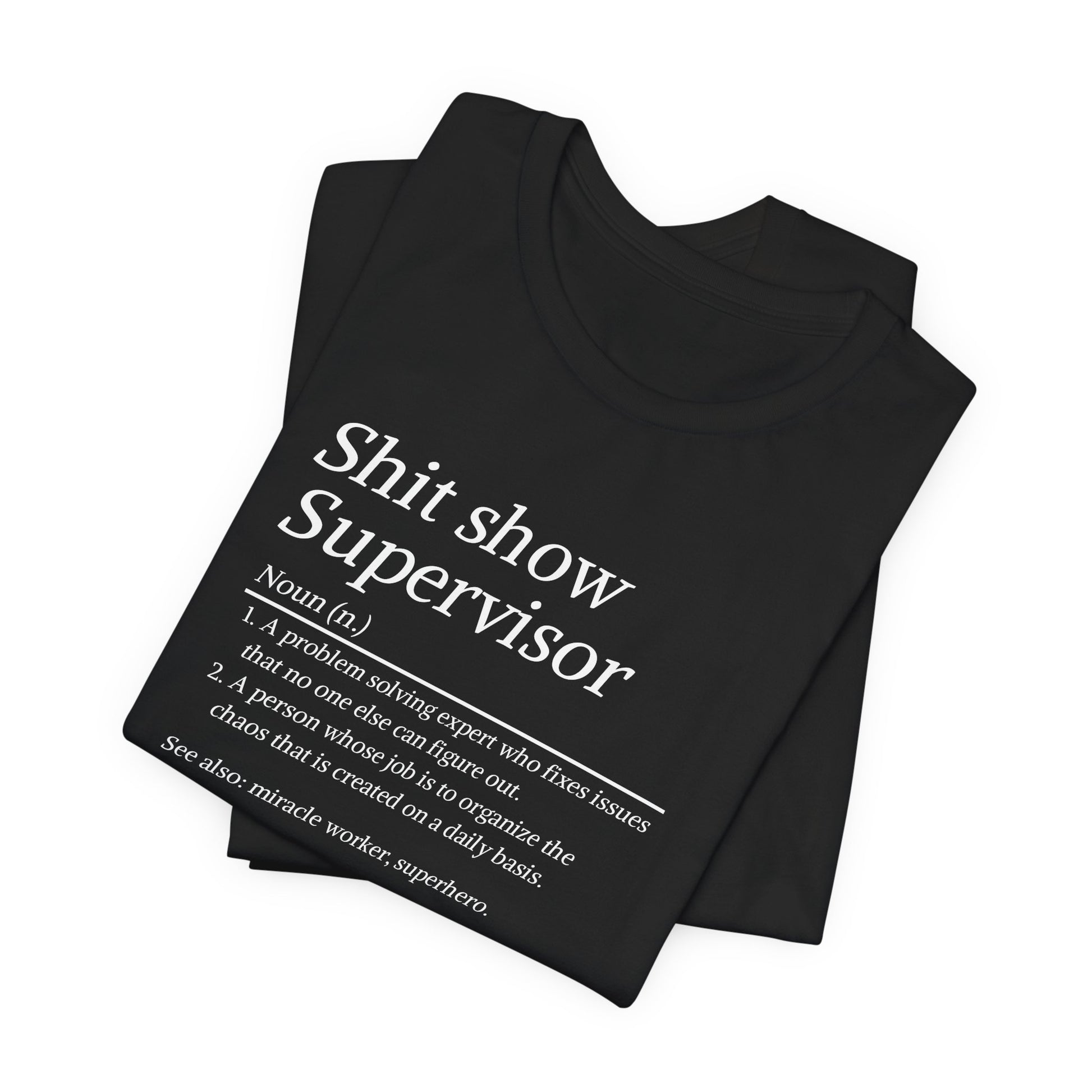 Black t-shirt with humorous text design on a white background