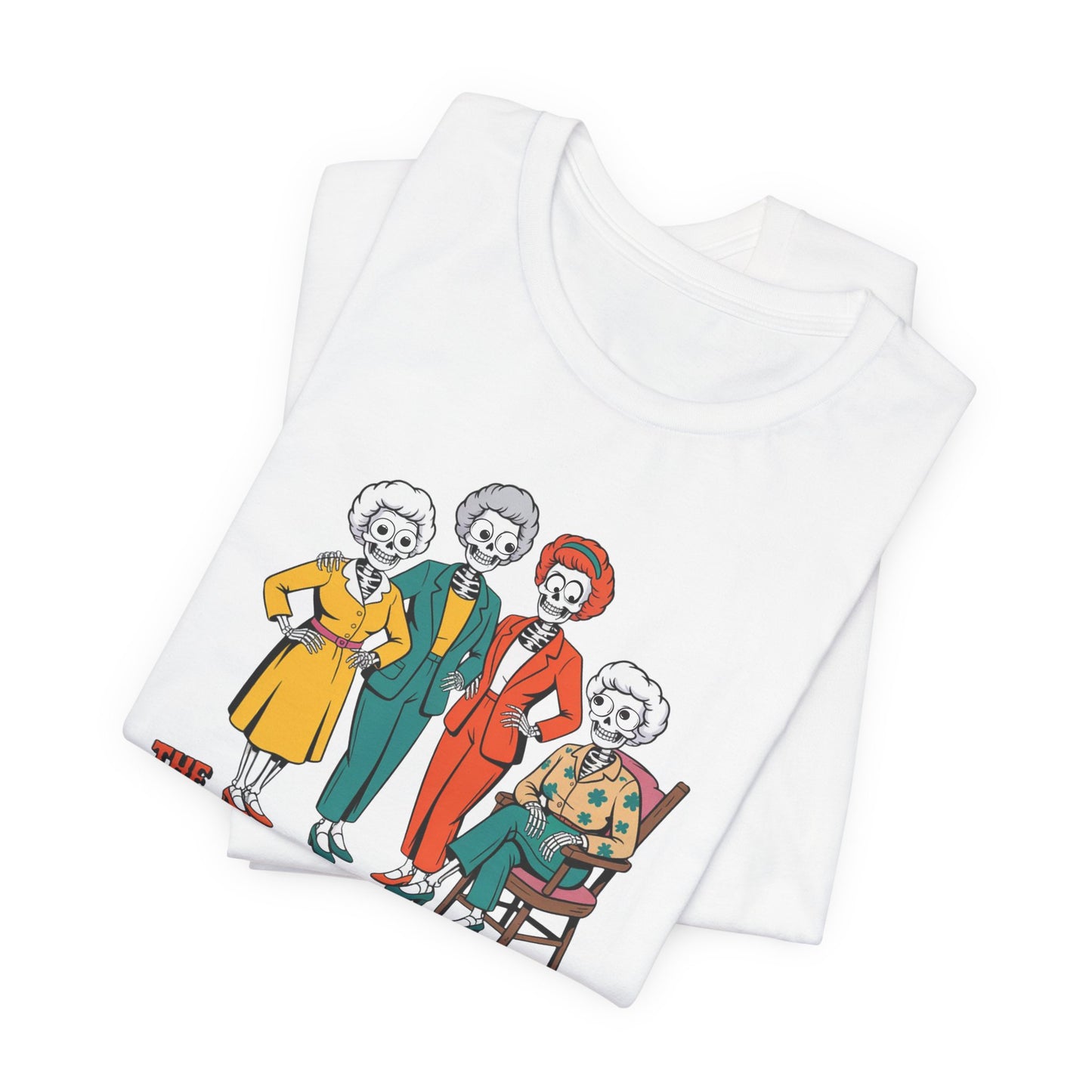Folded white towel with skeleton family design on a white background   Golden Girls, 80s TV, Halloween Tees